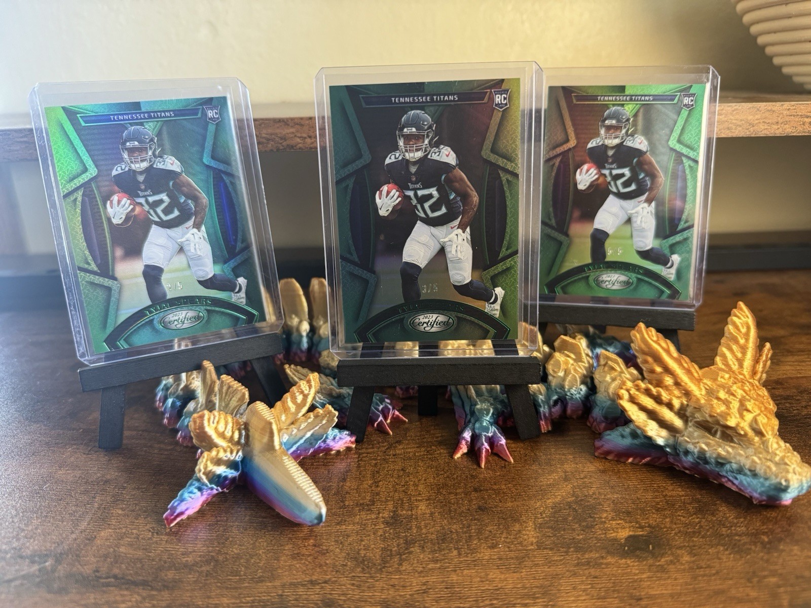 2023 Panini Certified Tyjae Spears #168 (RC) Green Mirror 2/5, 3/5, & 5/5.