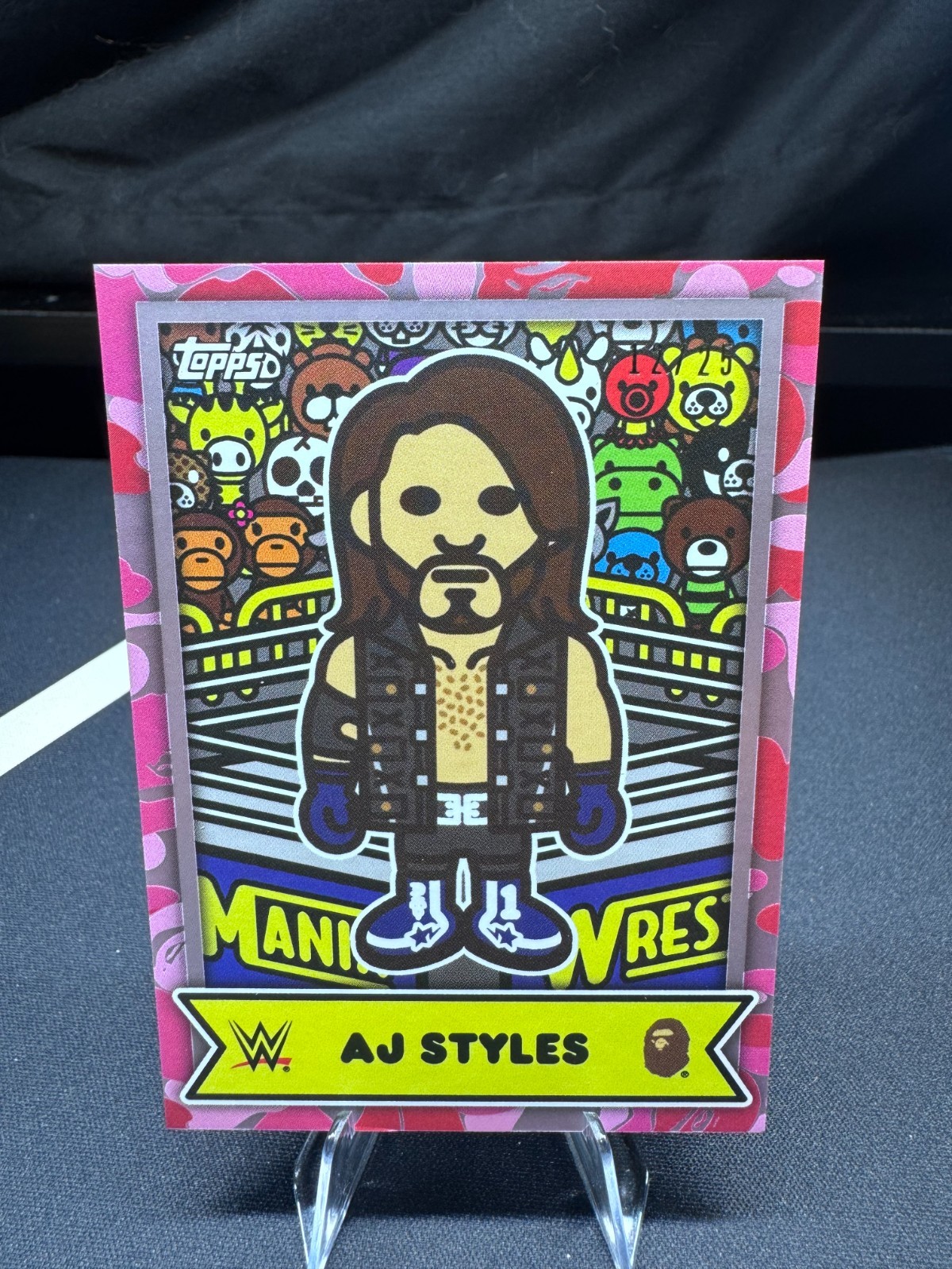 2025 Topps WWE X BAPE – AJ Styles Baby Milo BMA-12 Pink Camo #’d 12/25