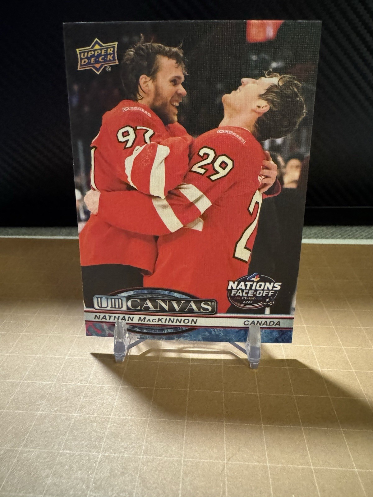 2025-26 Upper Deck Extended Series UD Canvas Nathan Mackinnon 4 Nations Face-Off