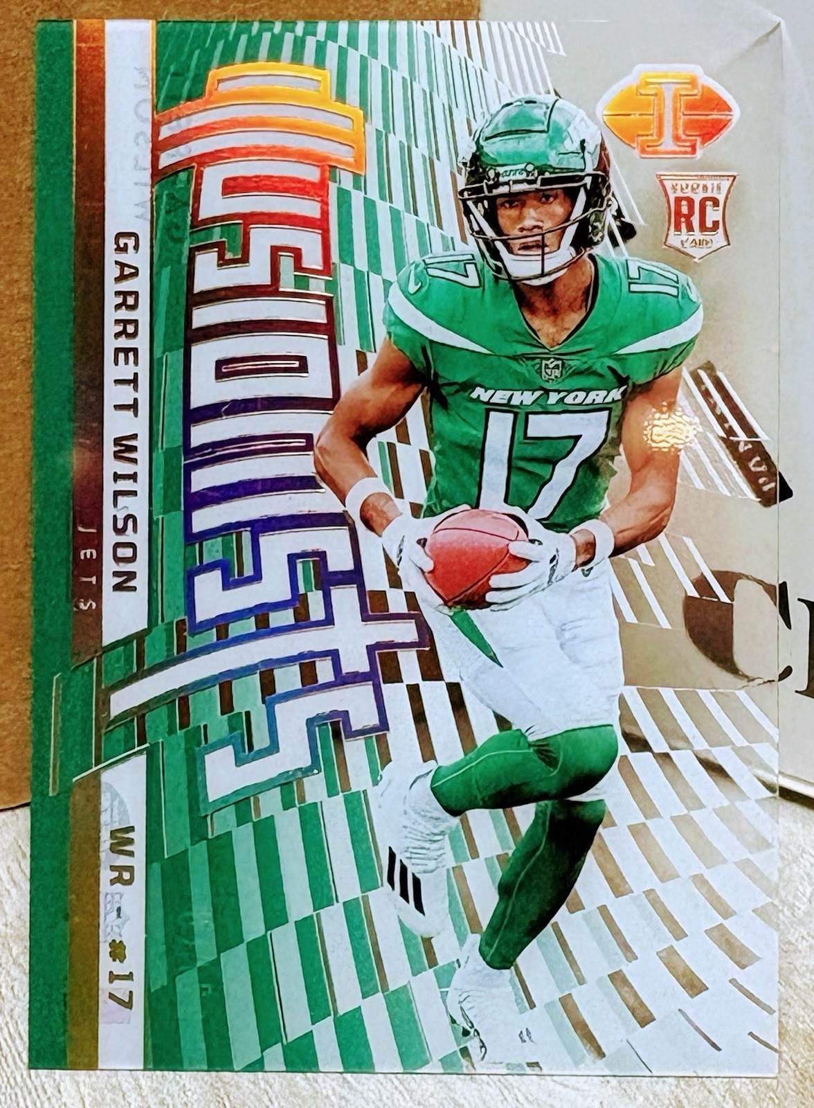 2022 Panini Illusions – Rookie Vision Signatures /10 Garrett Wilson Green