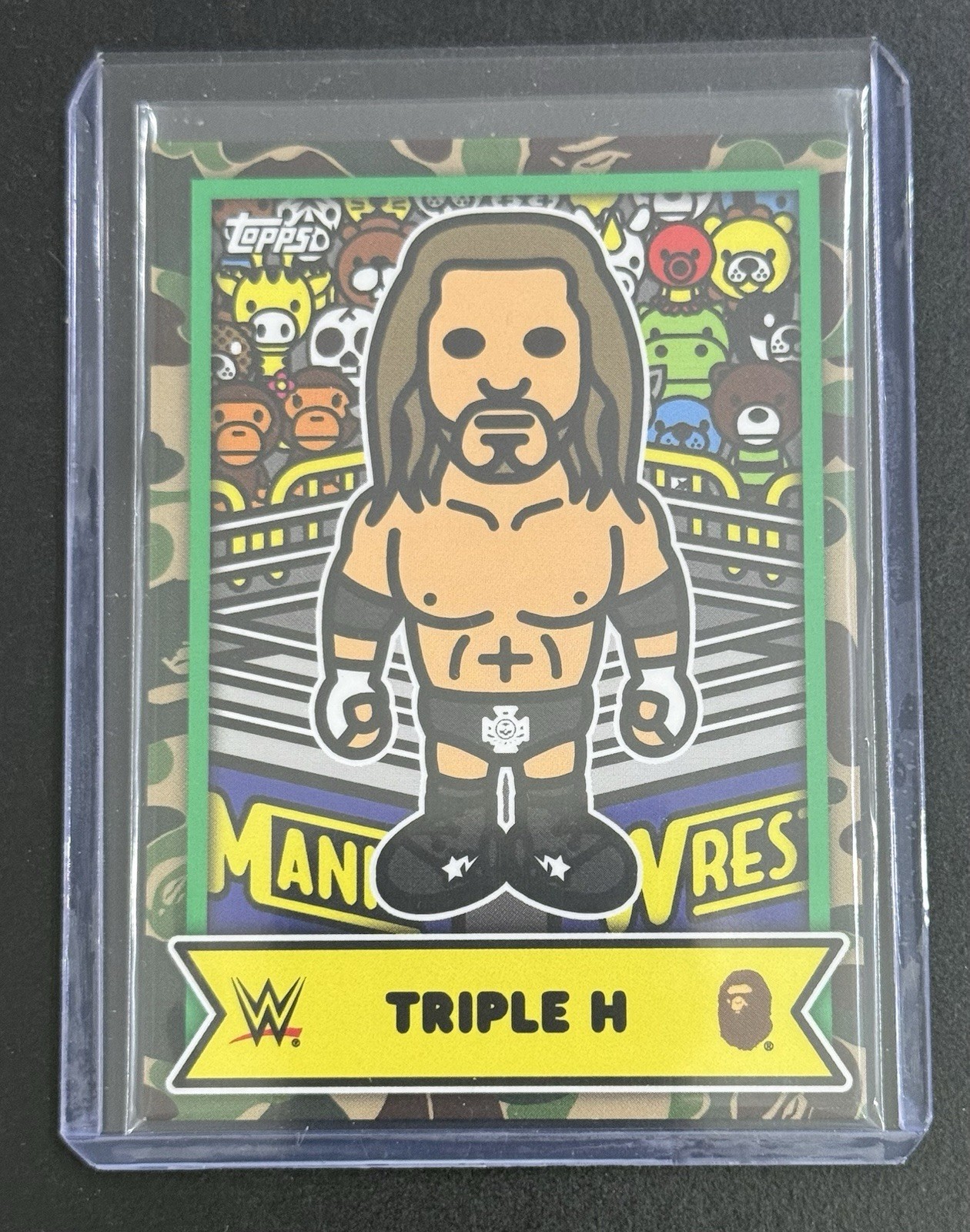 2025 Topps WWE X BAPE Triple H Baby Milo Insert Base Camo BMA-21