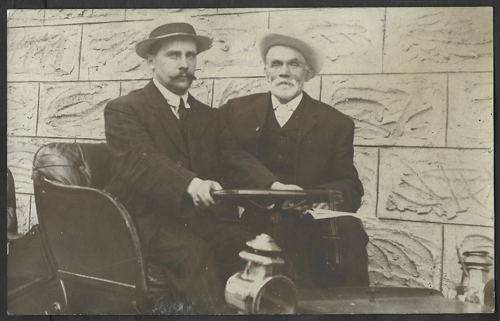 1900’s RRPC Two Men Driving A Very Early Automotive Postcard