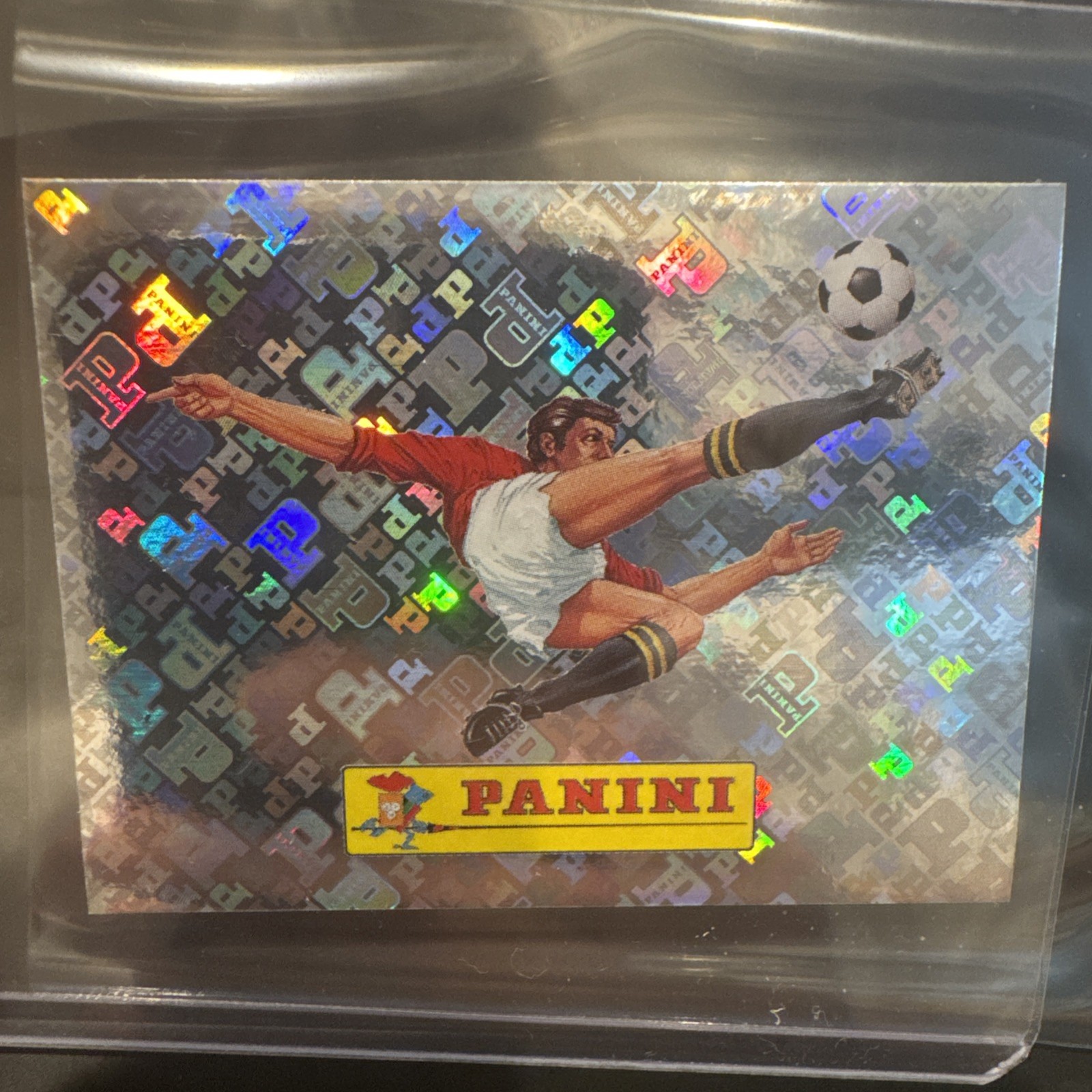 2026 Panini FIFA World Cup #00 Panini Logo Foil Sticker US Edition