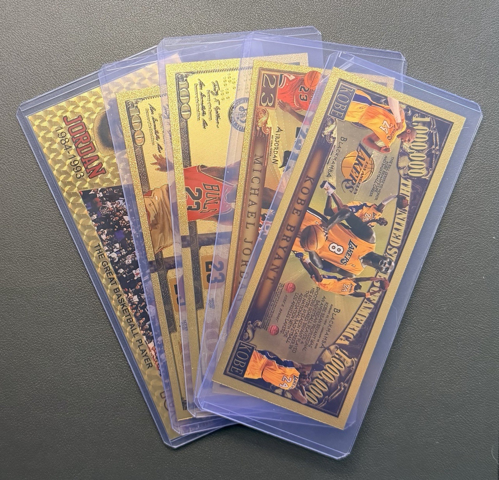 Michael Jordan 24k Gold Foil Banknotes w/ 1 Kobe Note – LOT of 5 In Top Loaders