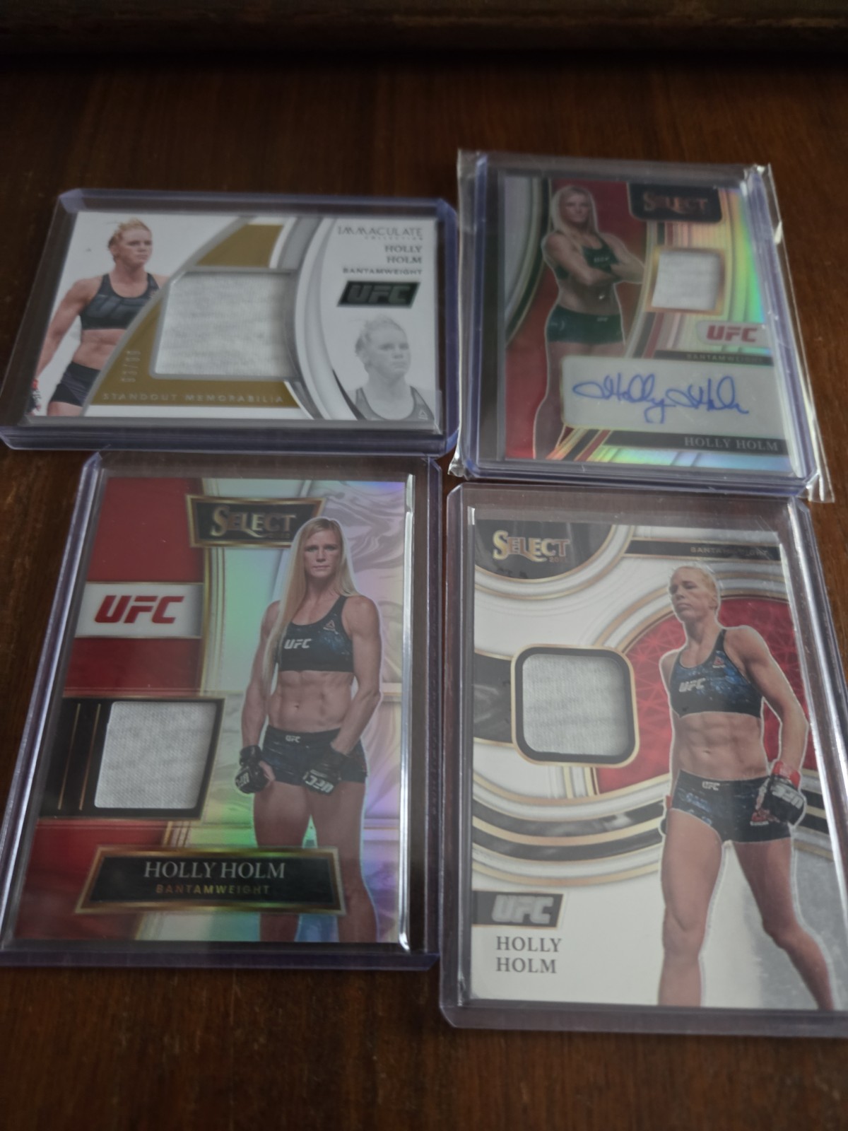 Holly Holm 4 Card Memorabilia and Auto Lot. Three Cards Numbered. See details.