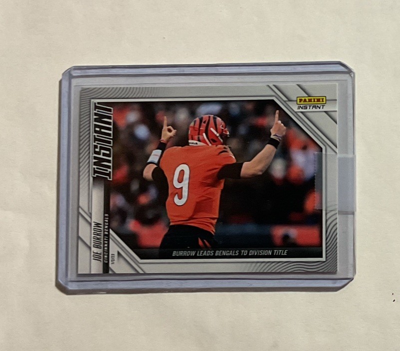 2021-22 JOE BURROW LEADS BENGALS TO DIVISION TITLE PANINI INSTANT NFL CARD #157
