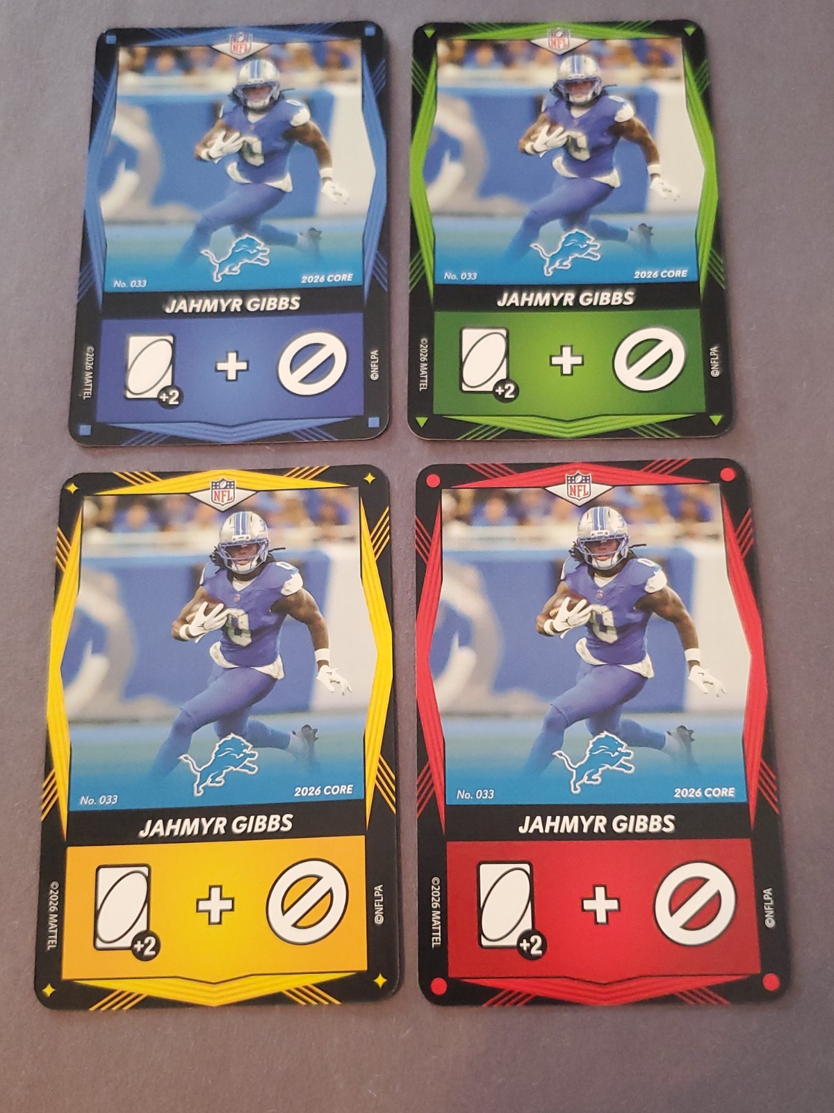 Jahmyr Gibbs 2026 Uno Elite 1 each Blue Green Yellow & Red #033 Detroit Lions