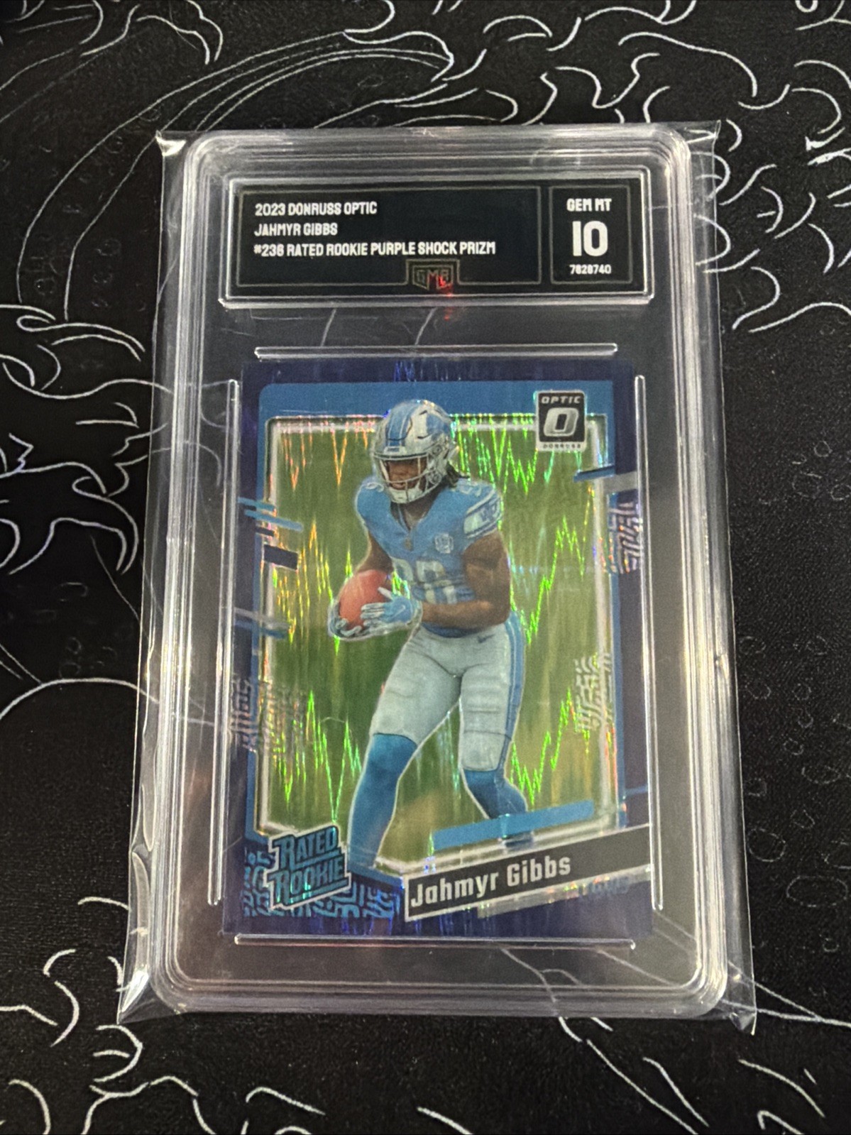 2023 Optic Rated Rookie Jahmyr Gibbs #236 Purple Shock Prizm GMA Gem MT 10