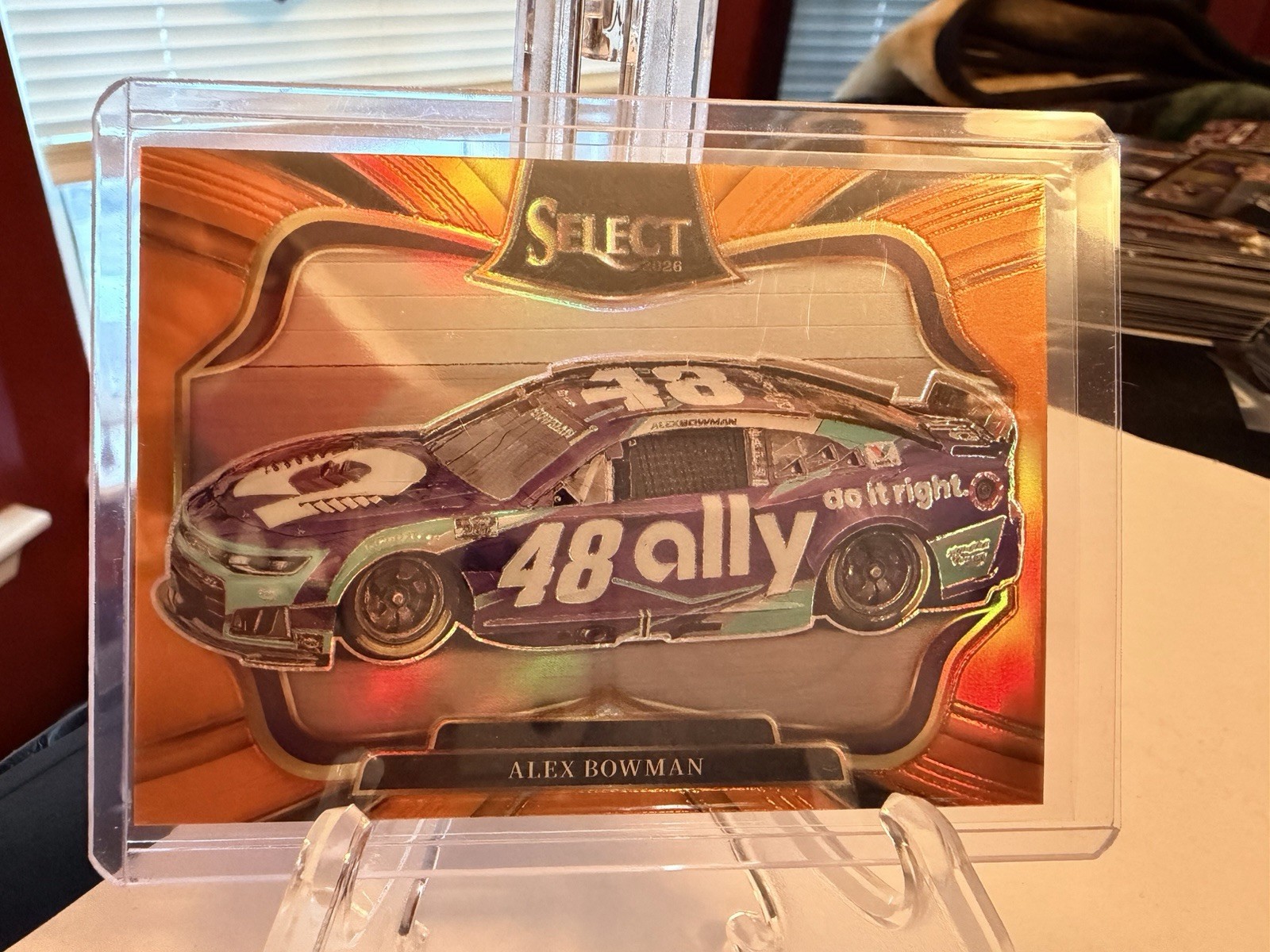ALEX BOWMAN – 2026 Select Racing Pit Road #’d /49 ORANGE Prizm #111