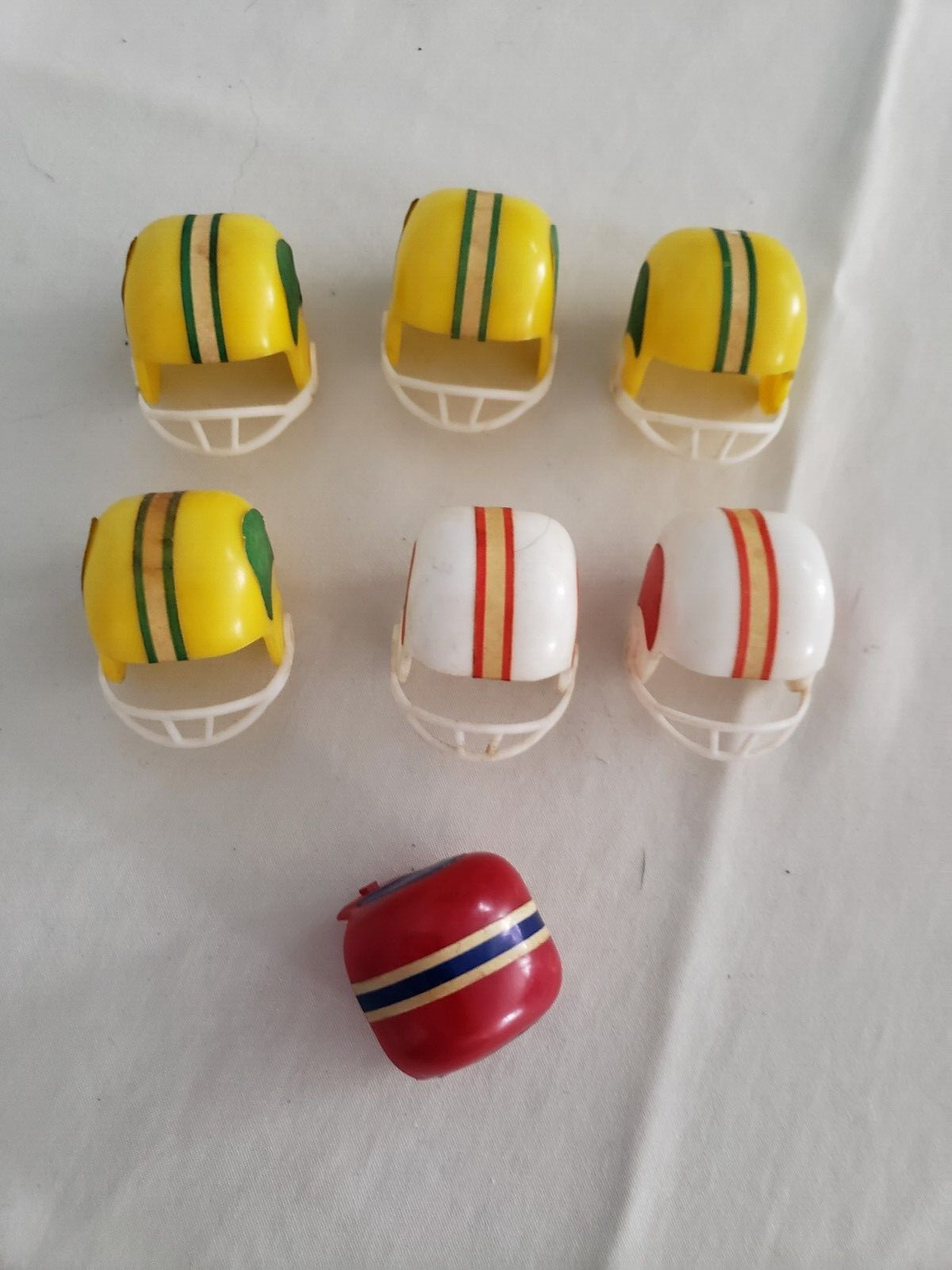 Lot of 7 Miniature Plastic Football Helmets WILTON HONG KONG CAKE TOPPERS