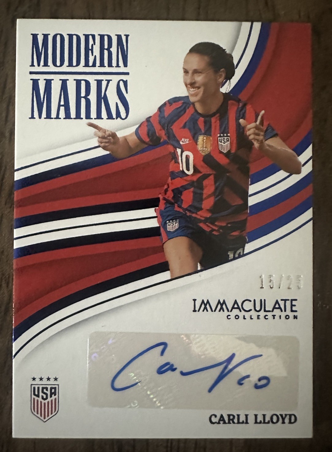 2023-24 Panini Immaculate Collection Modern Marks Carli Lloyd Sapphire /25 USA