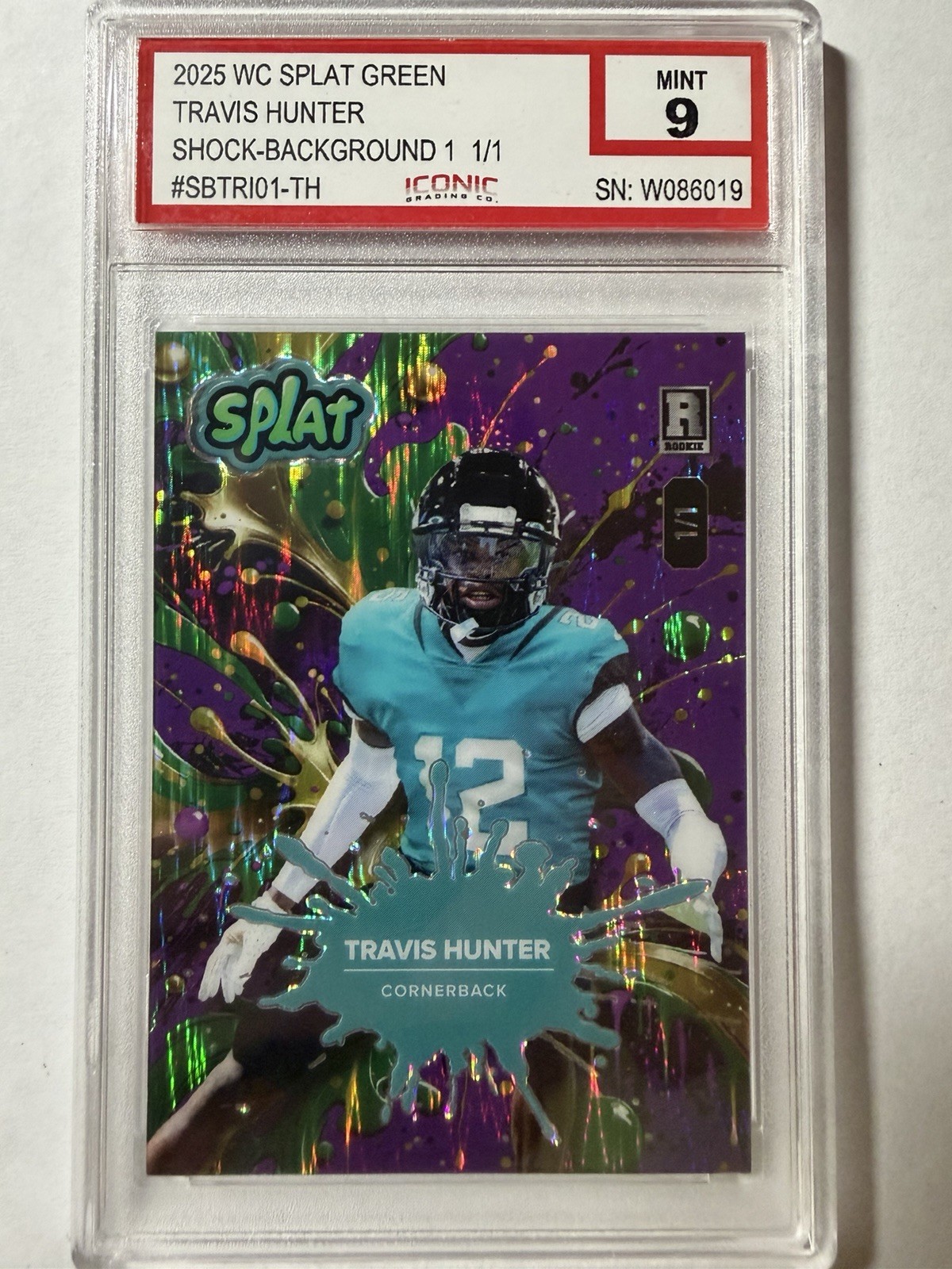 Wild Card 2025 WC Splat Green Shock-Background Travis Hunter 1/1 Rookie IGC 9