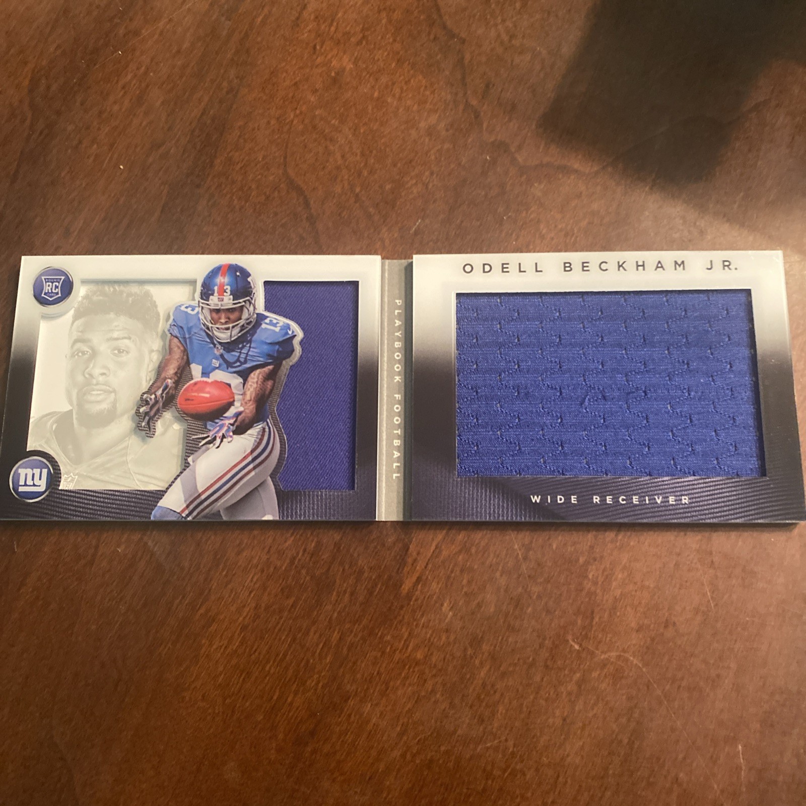 2014 Panini Playbook – Rookie Booklet #139 Odell Beckham Jr. 50/199. RC. Giants