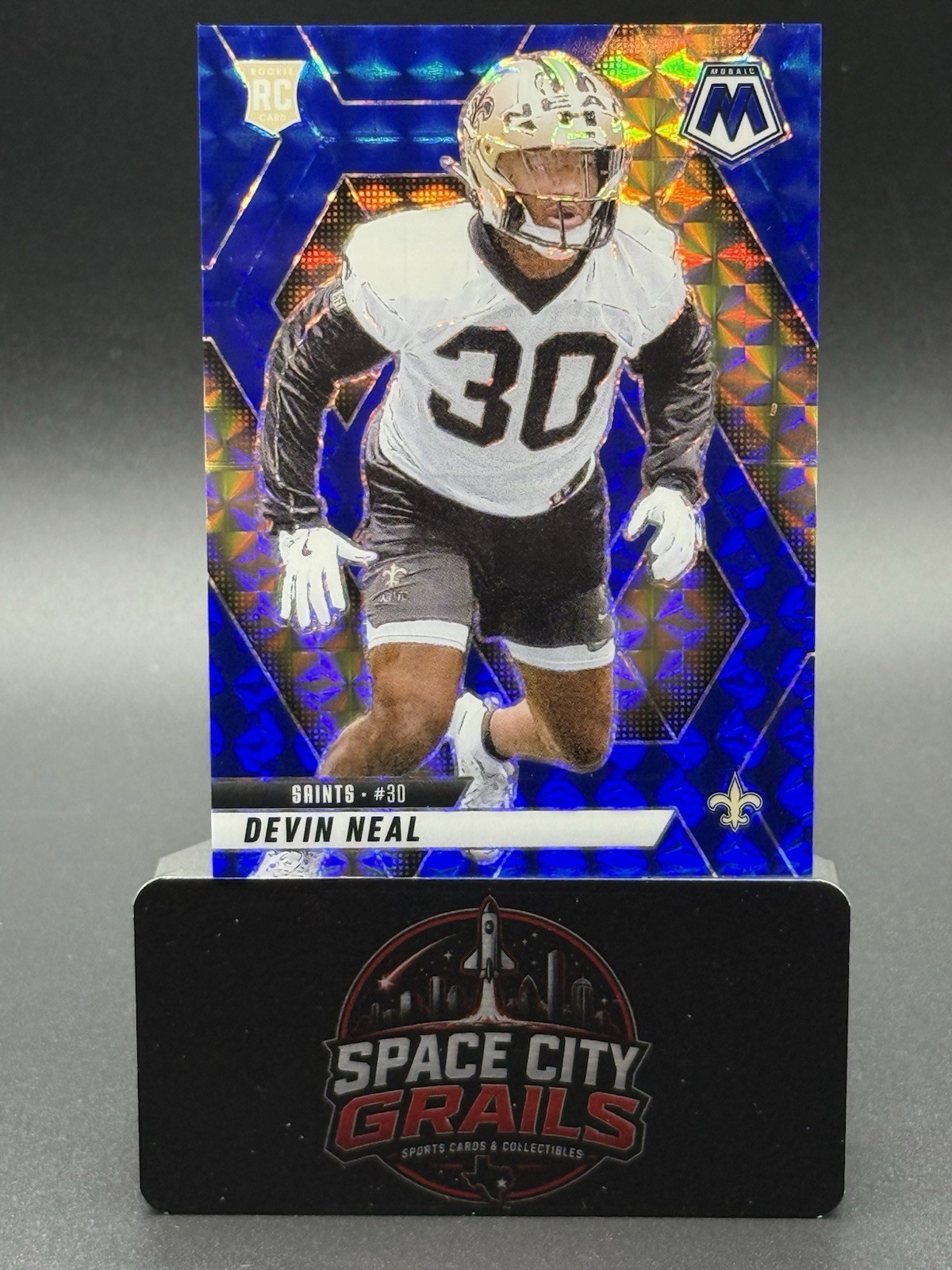 2025 Panini Mosaic – Rookies Devin Neal #330 Blue Mosaic Prizm /99 (RC)
