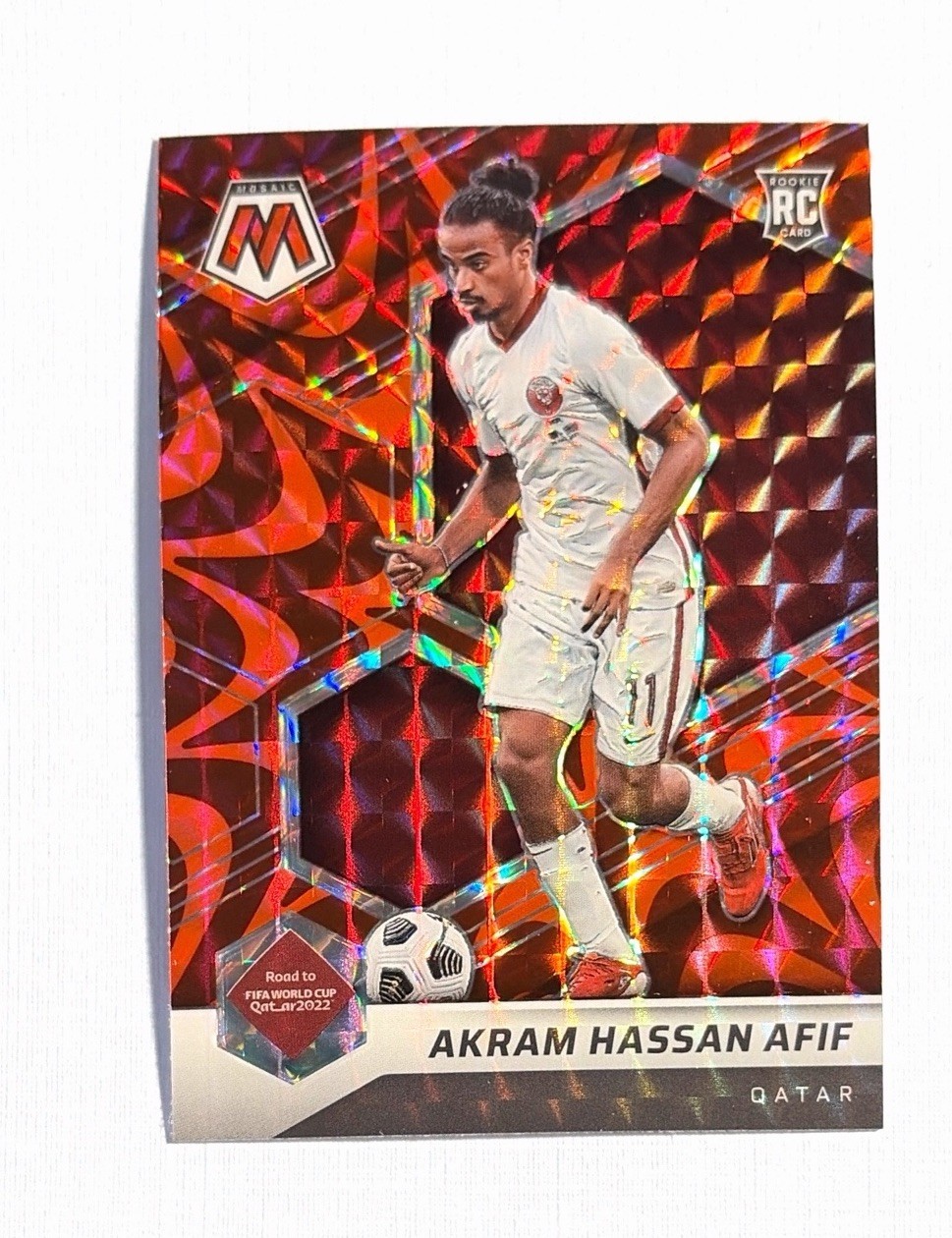 Akram Hassan Afif ~ 2021-22 Panini Mosaic FIFA World Cup/ Rookie Reactive Red 70
