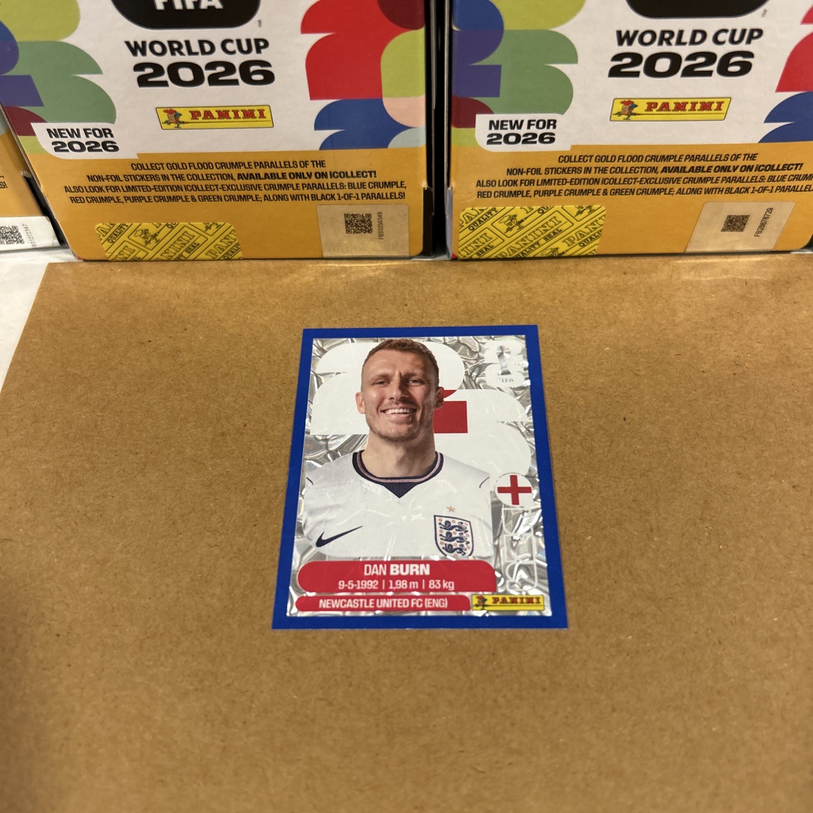 2026 Panini World Cup Sticker Blue Crumple Parallel England Dan Burn ENG8