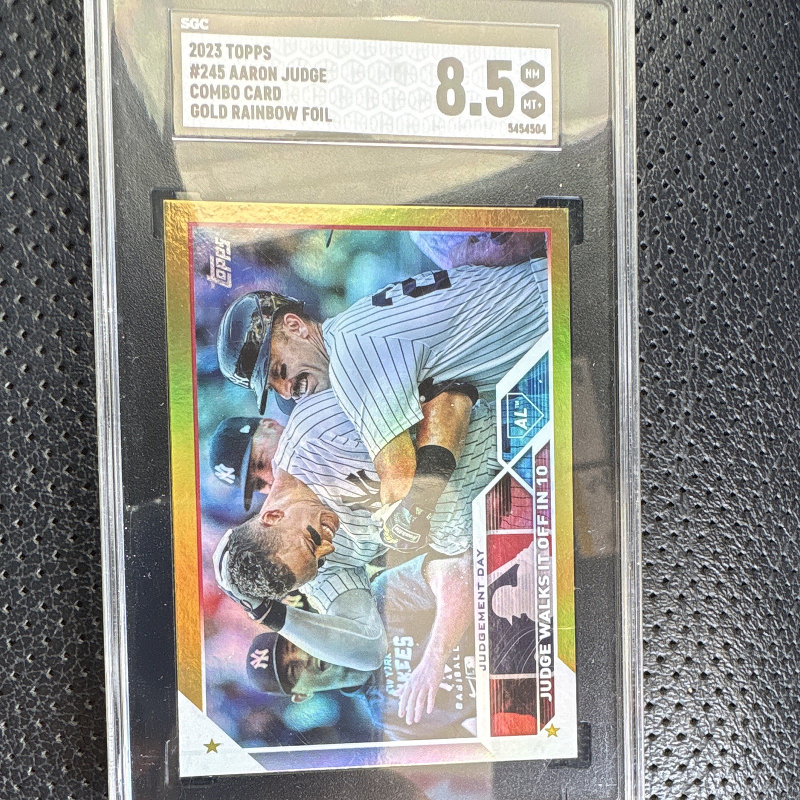 Topps 2023 Series 1 Aaron Judge Judgement Day #245 Gold Rainbow Foil SGC 8.5