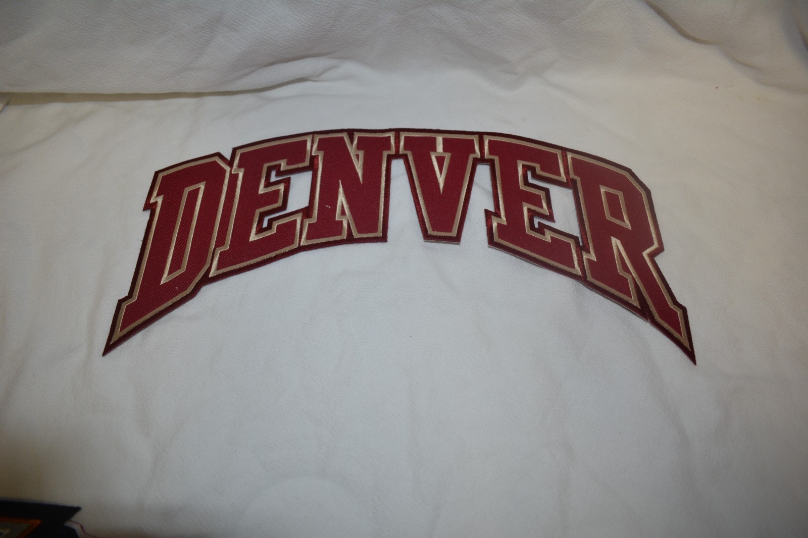 DENVER PIONEERS Hockey Patch Crissom with Gold Trim 14”
