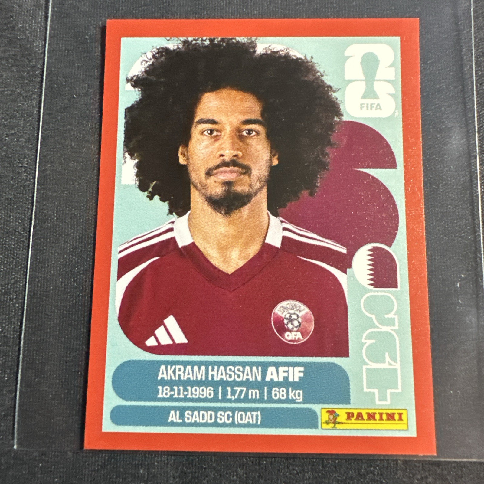 Panini FIFA World Cup 2026 Soccer Sticker QAT 18 Red Akram Hassan Afif