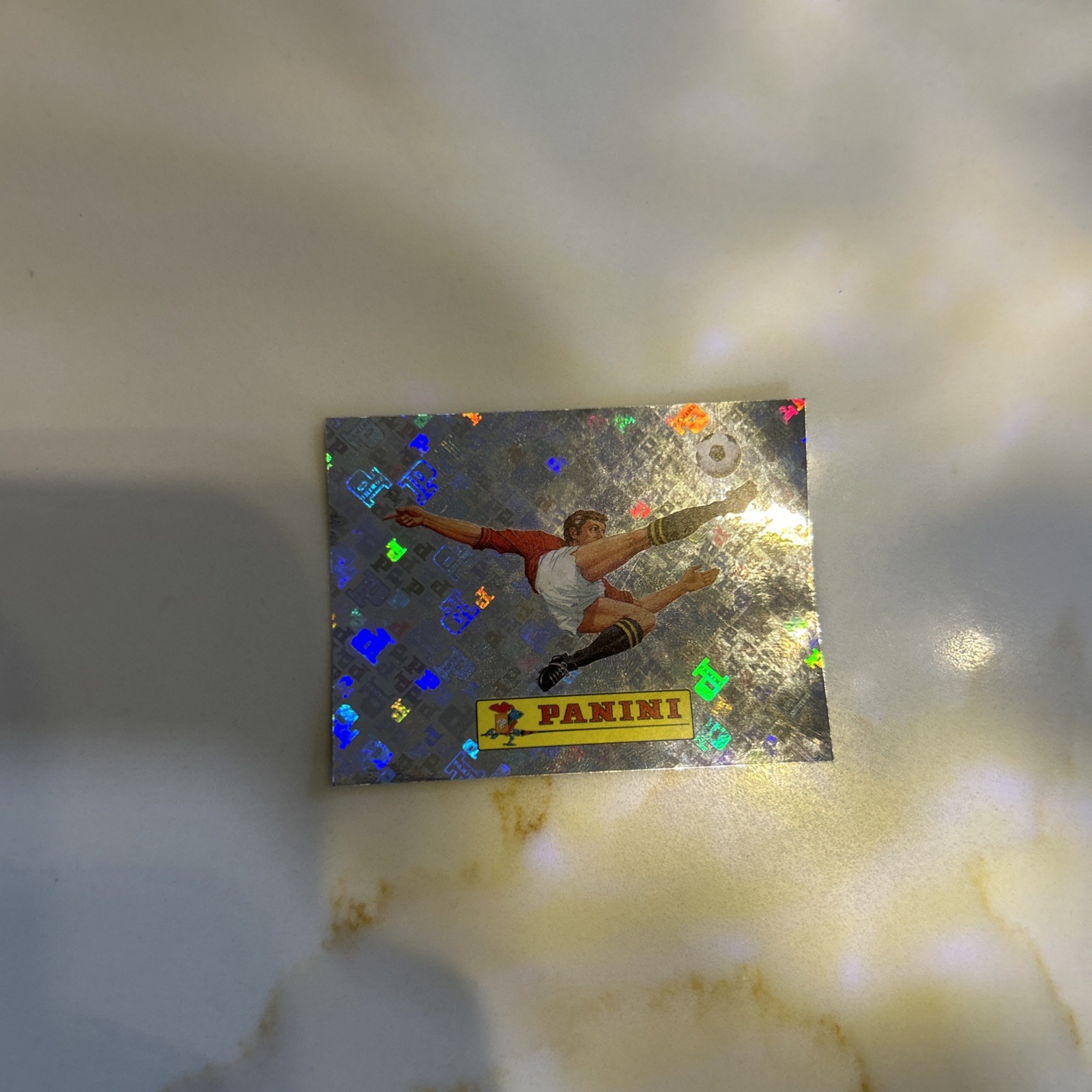2026 Panini FIFA World Cup Sticker Collection 00 Panini Logo FOIL