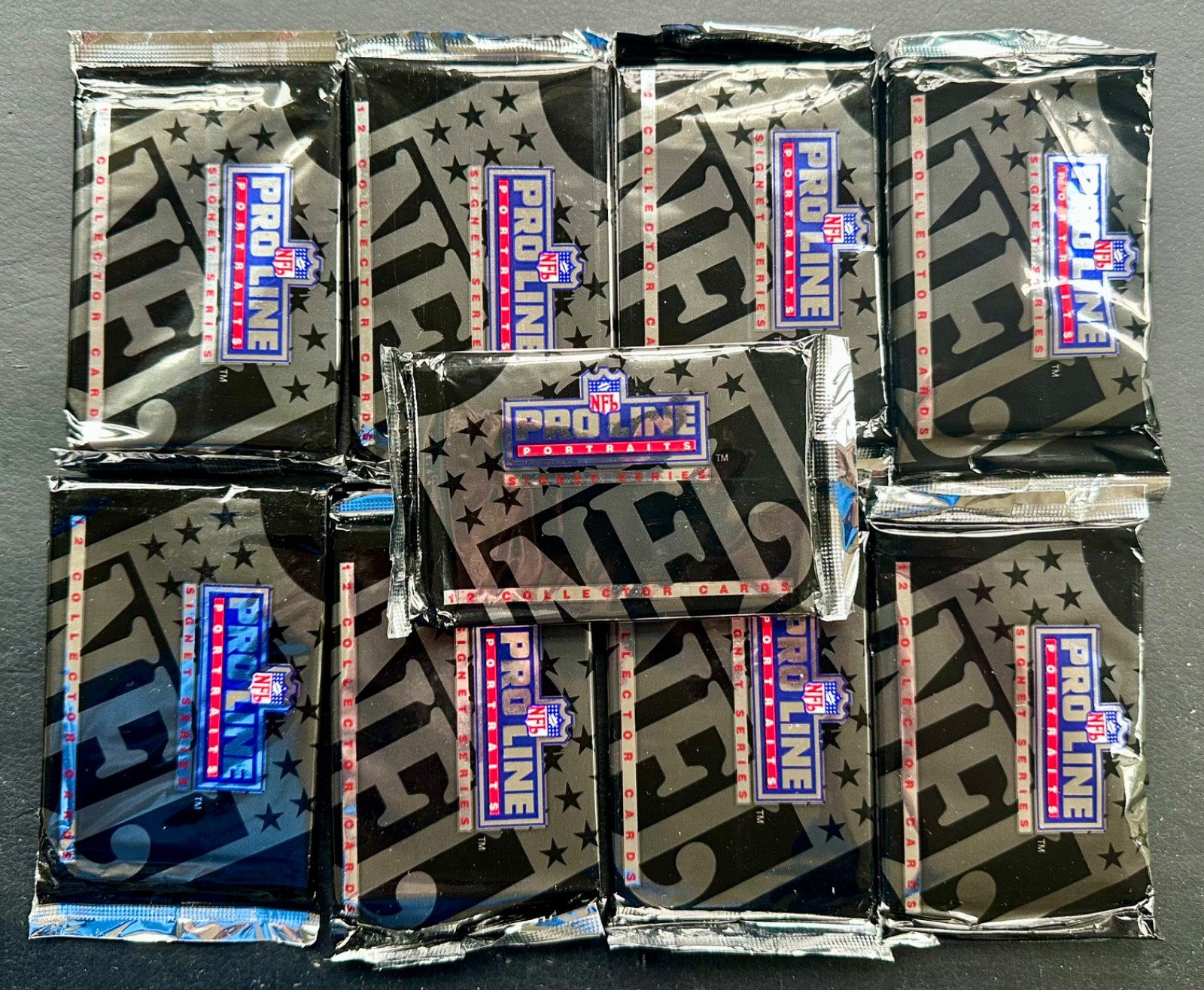 Nine 1991 Proline Football Unopened packs – straight from the box
