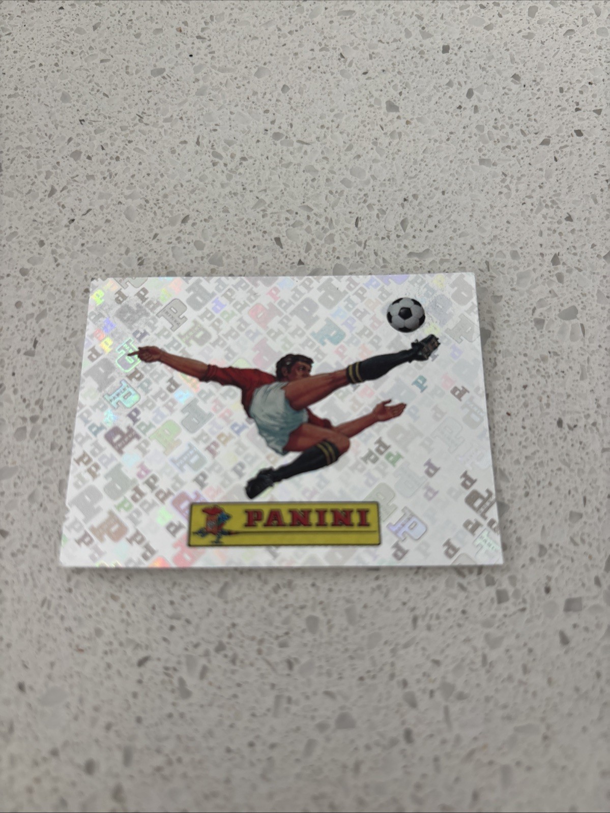 2026 Panini FIFA World Cup Sticker 00 Panini Logo FOIL FWC00