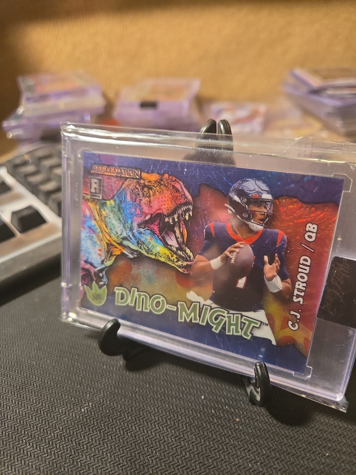 2023 Panini Illusions C.J. Stroud AD-CS1 RC Dino-might
