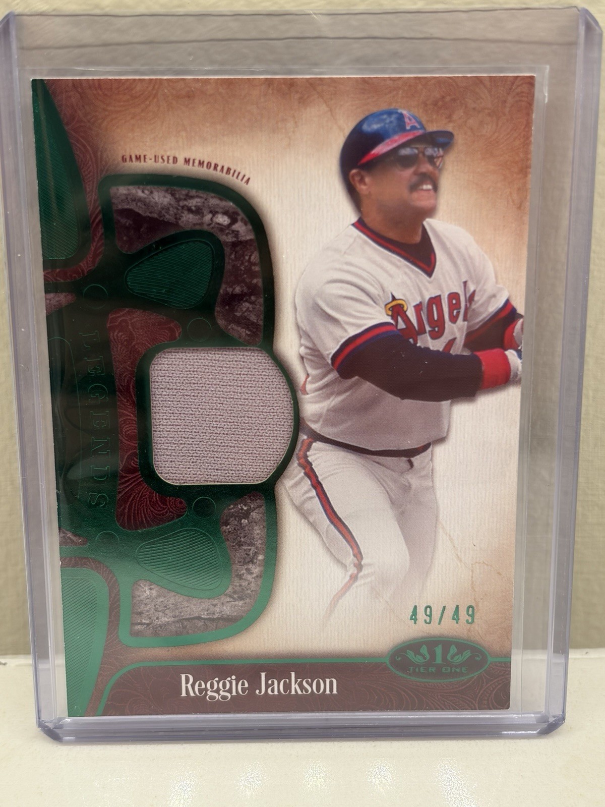 2026 Topps Tier One – Reggie Jackson Legend Relic Green Foil Bookend 49/49