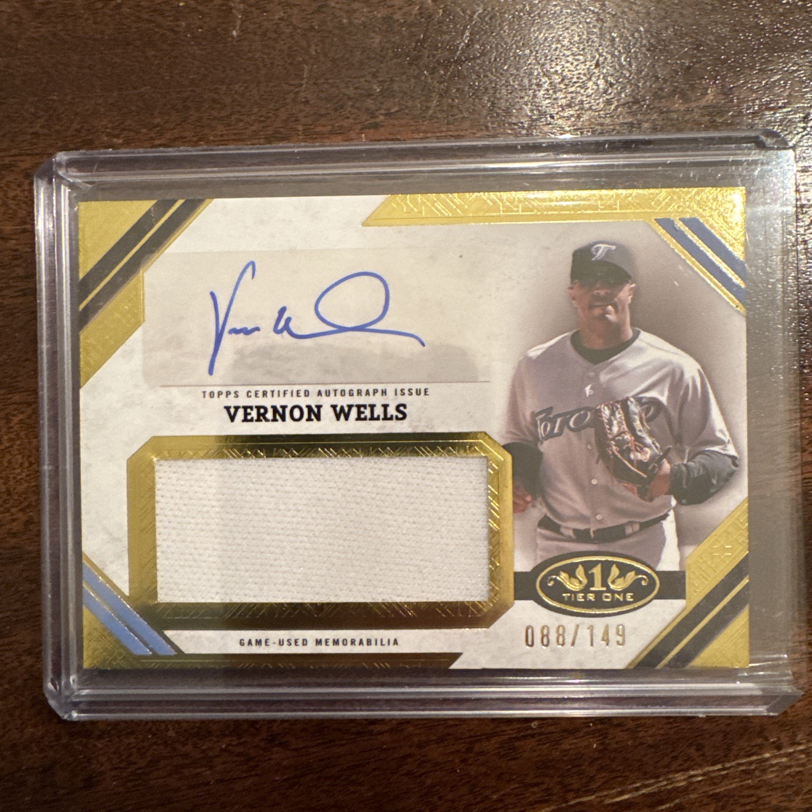 Vernon Wells 2025 Topps Tier One Bronze Foil /149 Auto Game Used Patch