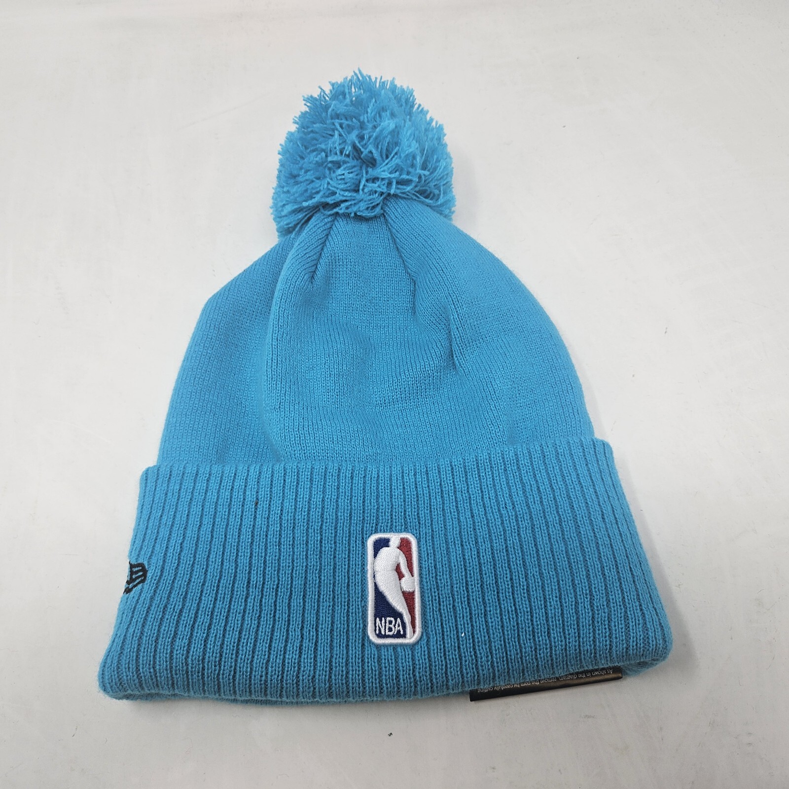 Unisex Adult New Era Brooklyn Nets x KAWS City Edition Blue Pom Knit Beanie