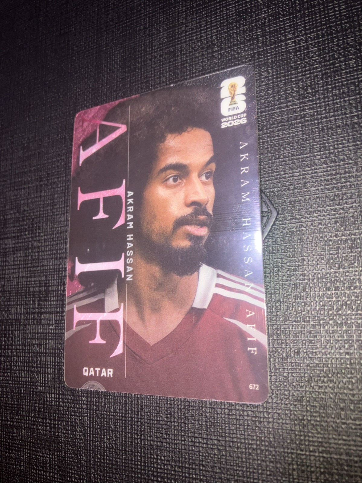 2026 Panini FIFA World Cup Akram Hassan AFIF SSP Acetate Case Hit Card #672