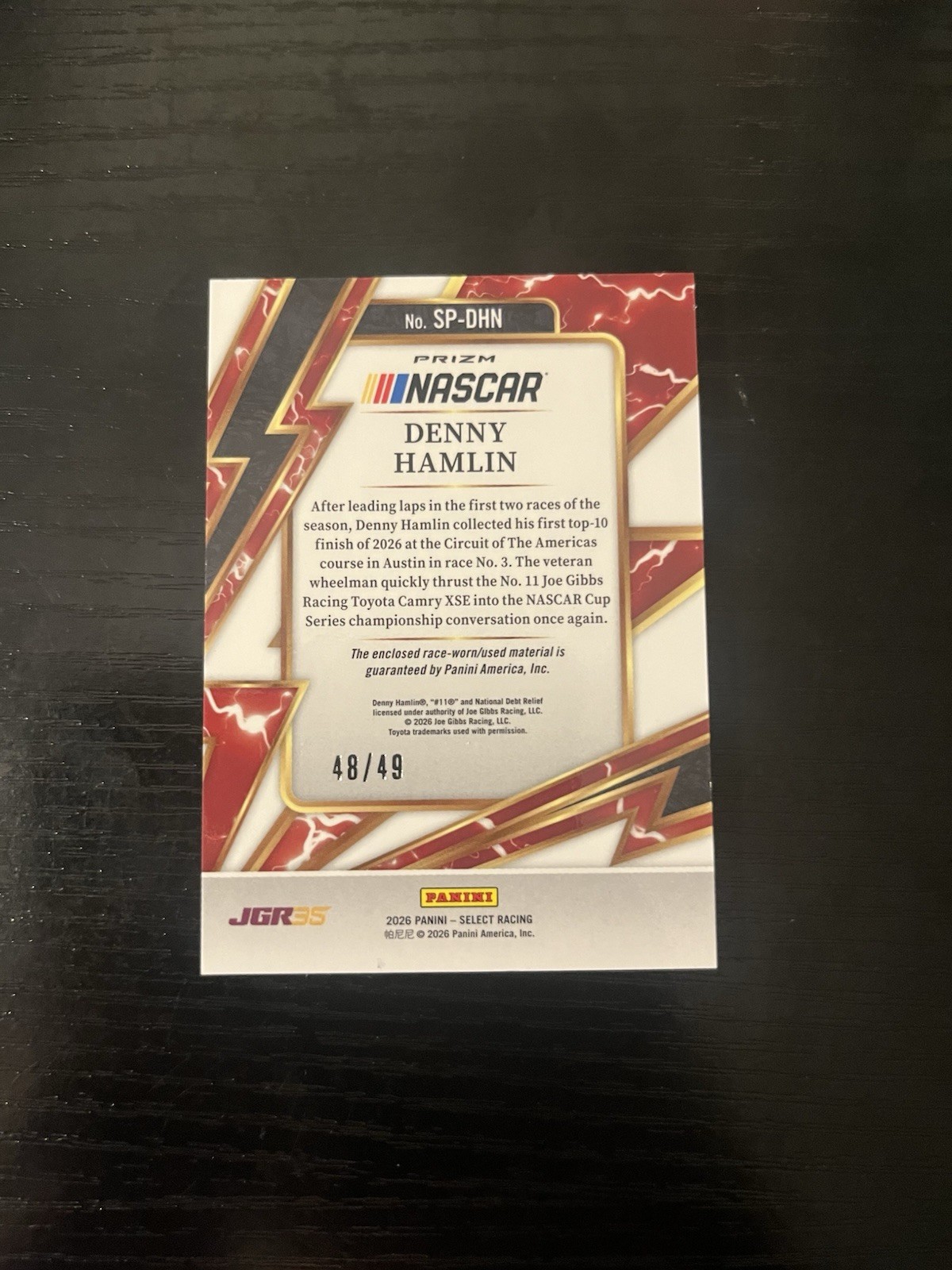 Denny Hamlin 2026 Panini Select Sparks Blue Race-Used Mem 48/49 National Debt