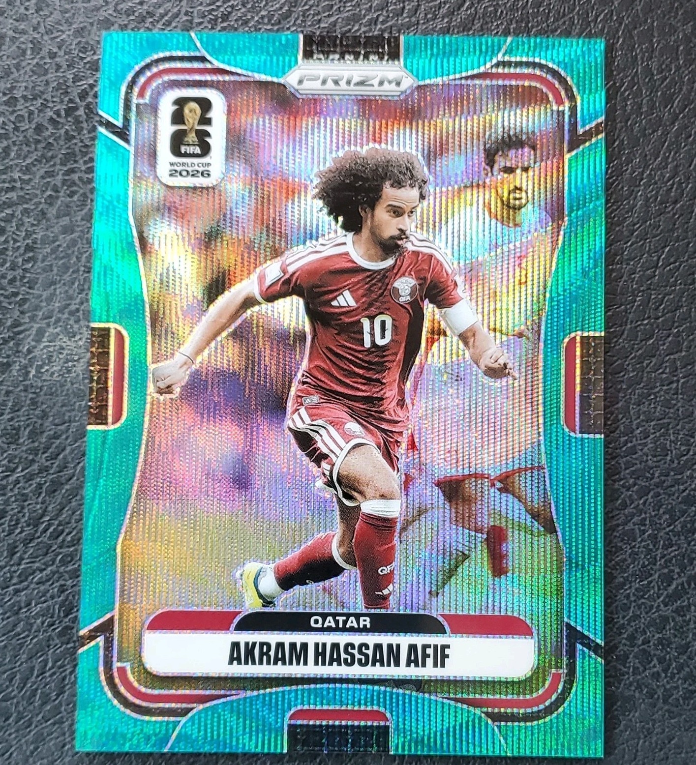 2026 Panini Prizm Fifa World Cup Akram Hassan Afif Teal Wave Prizm /99