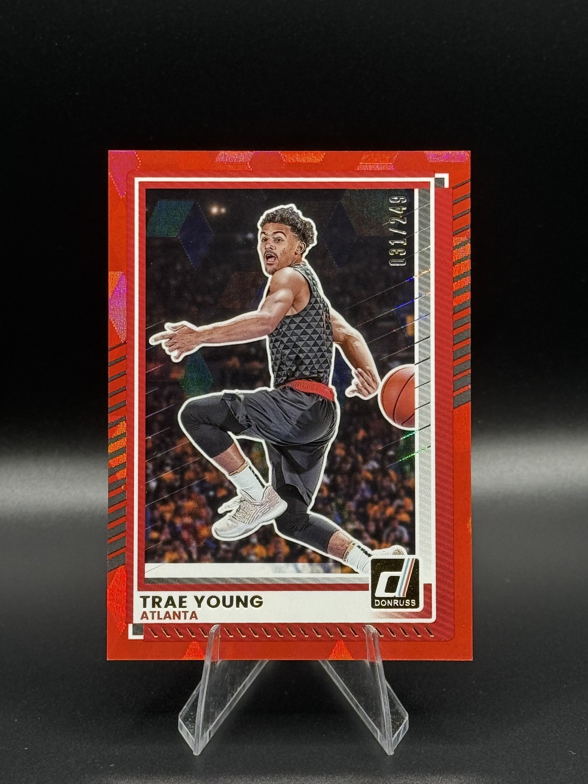 Trae Young Red Cubic /249 #107 2025-26 Panini Donruss Atlanta Hawks