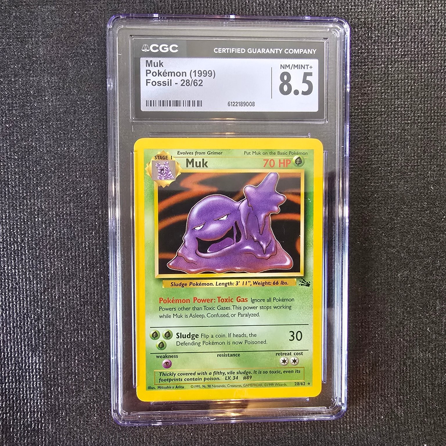 Pokemon Muk 1999 Fossil Wizards of the Coast CGC 8.5 NM/MINT+ #28/62