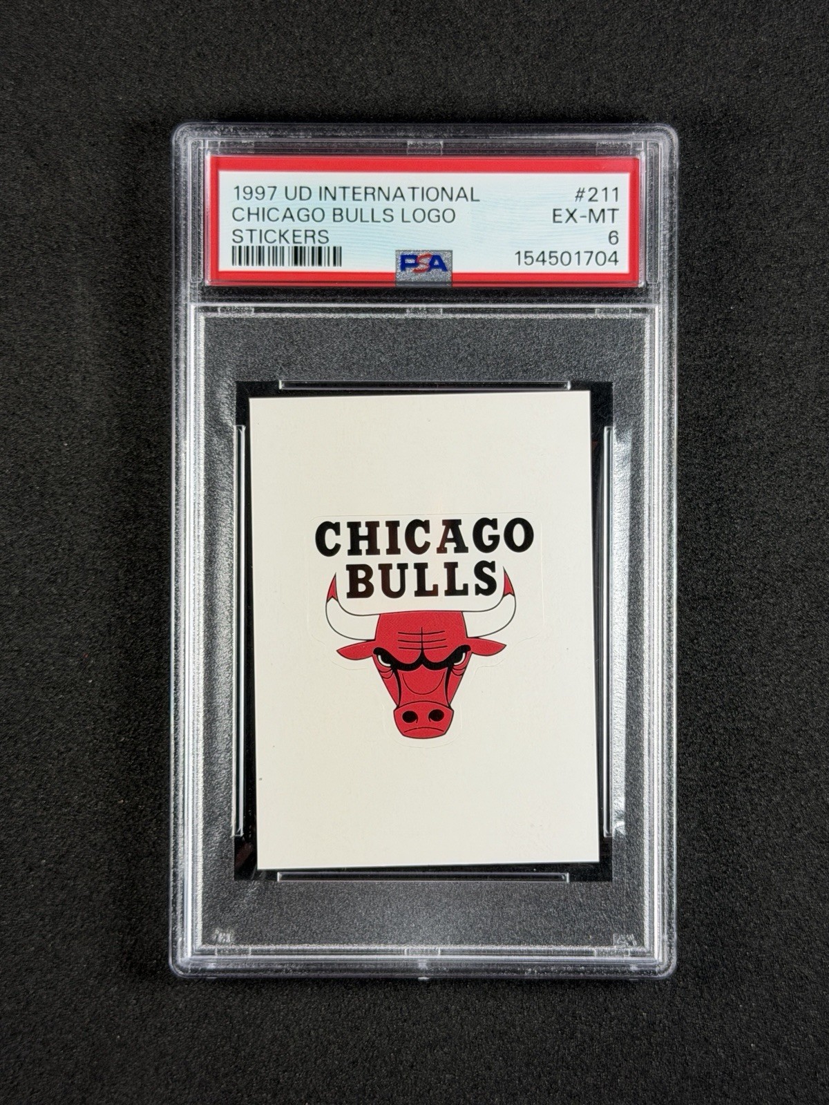 1997 Upper Deck Basketball International Stickers #211 Chicago Bulls Logo PSA 6