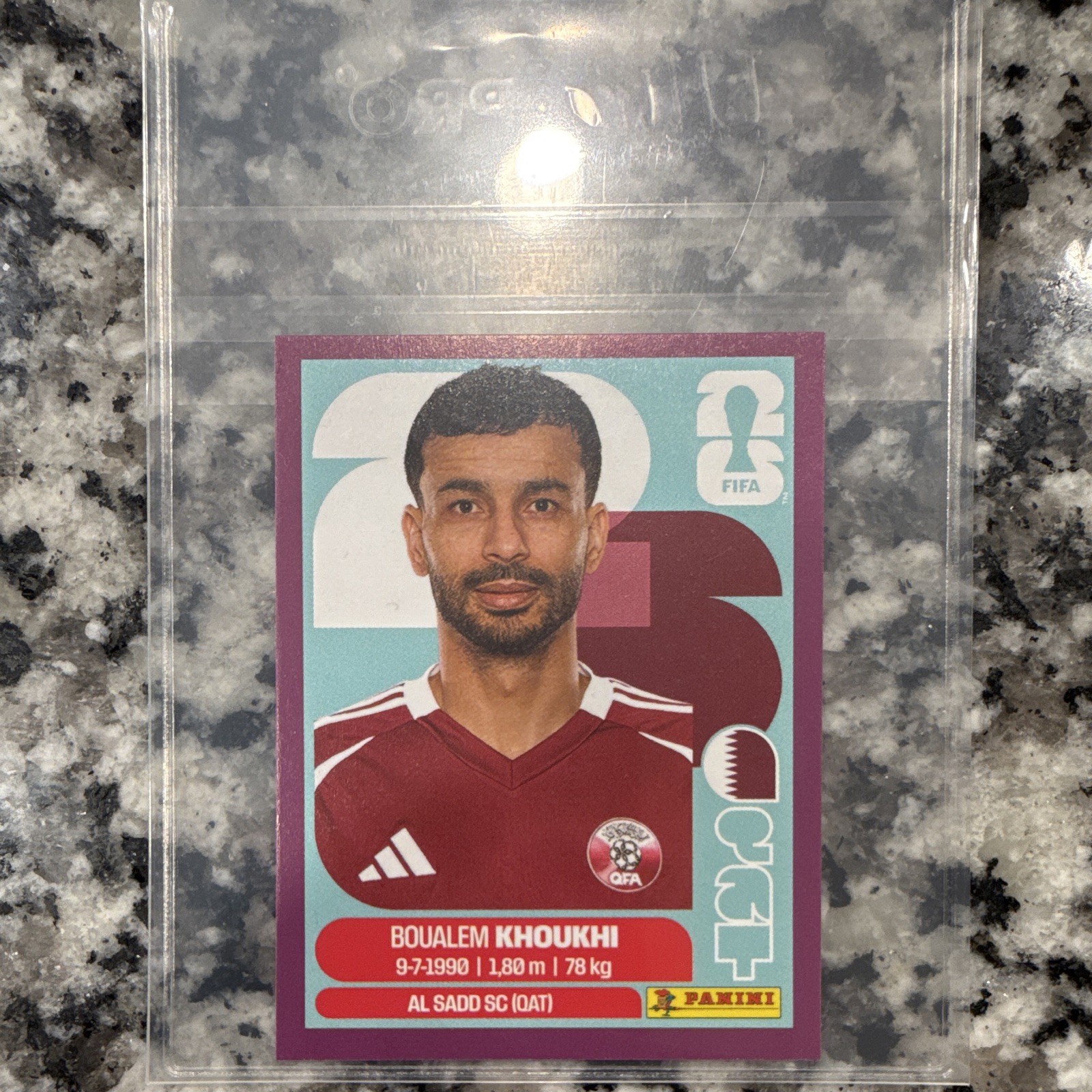 Panini FIFA World Cup 2026 Boualem Khoukhi QAT 6 Purple Parallel