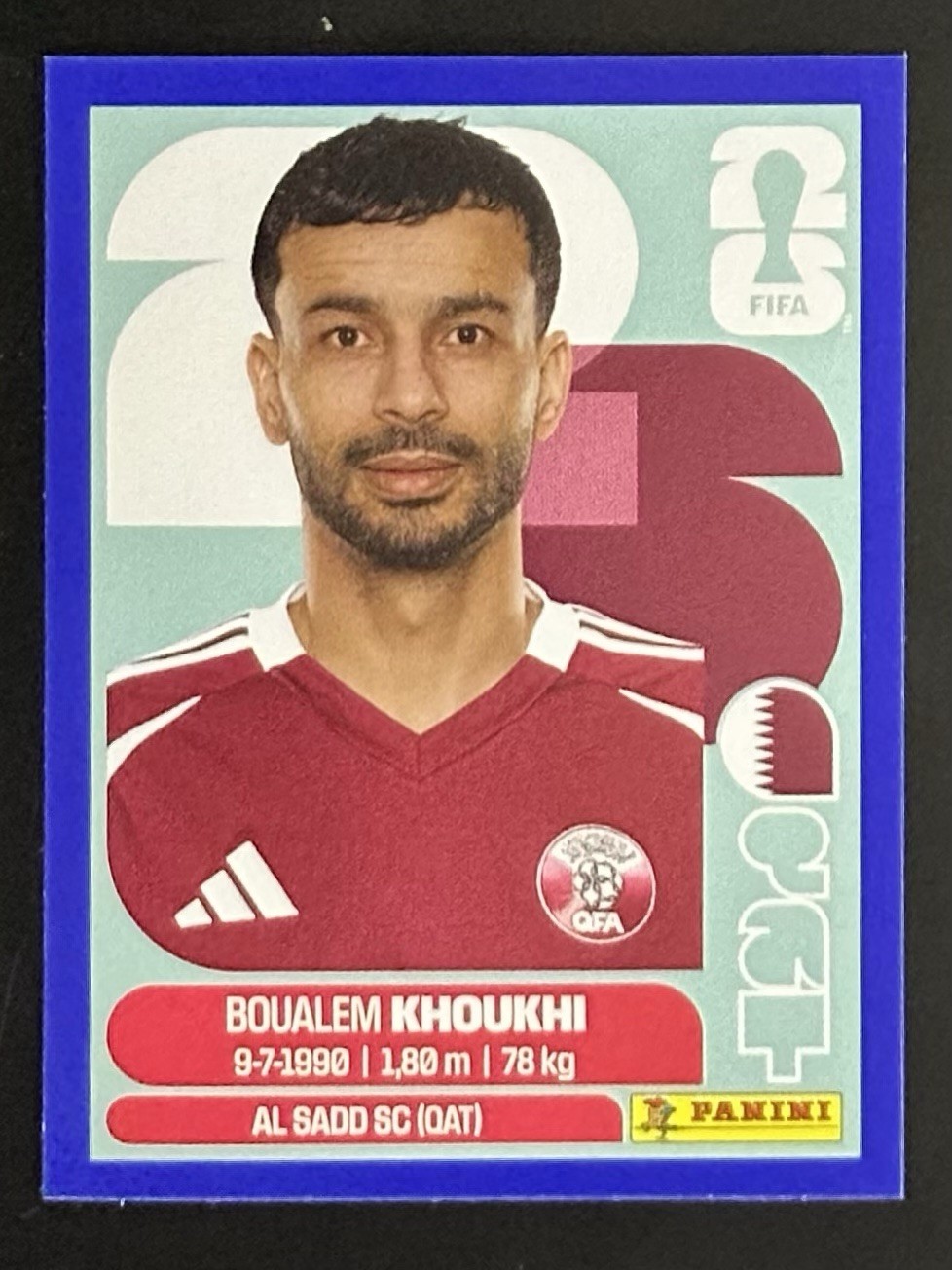 2026 Panini FIFA World Cup Sticker Boualem Khoukhi #QAT 6 – Blue Parallel