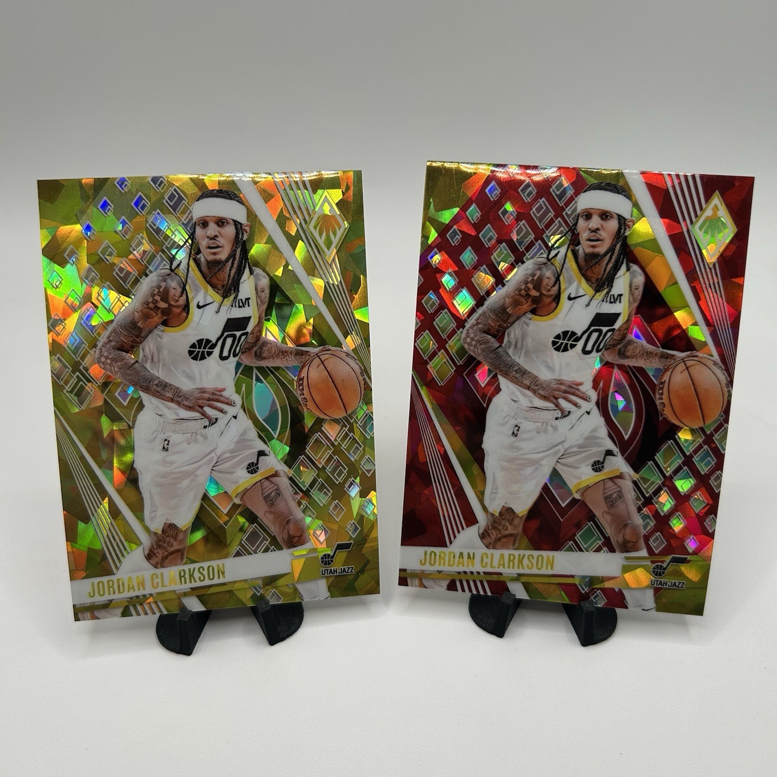 2 2023-24 Panini Phoenix Jordan Clarkson Phoenix Yellow Ice 70/175 & Red Ice #83