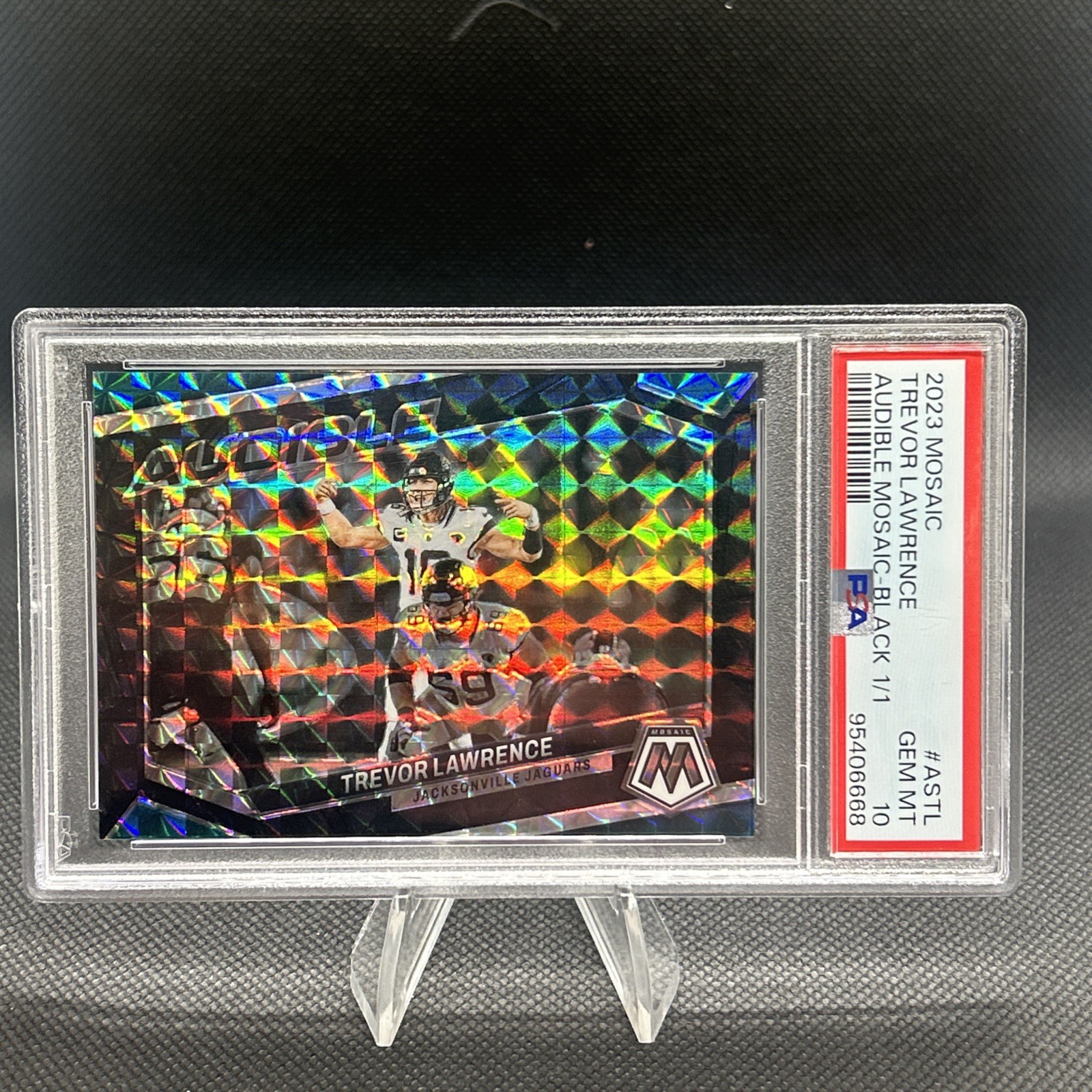 2023 Mosaic Trevor Lawrence Audible Mosaic Black 1/1 PSA 10. Jaguars.
