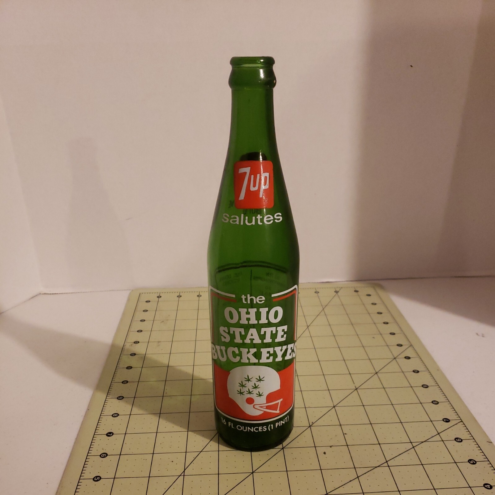 VINTAGE 1973 OHIO STATE BUCKEYES 16OZ 7UP BOTTLE. OSU NATIONAL CHAMPIONS-used