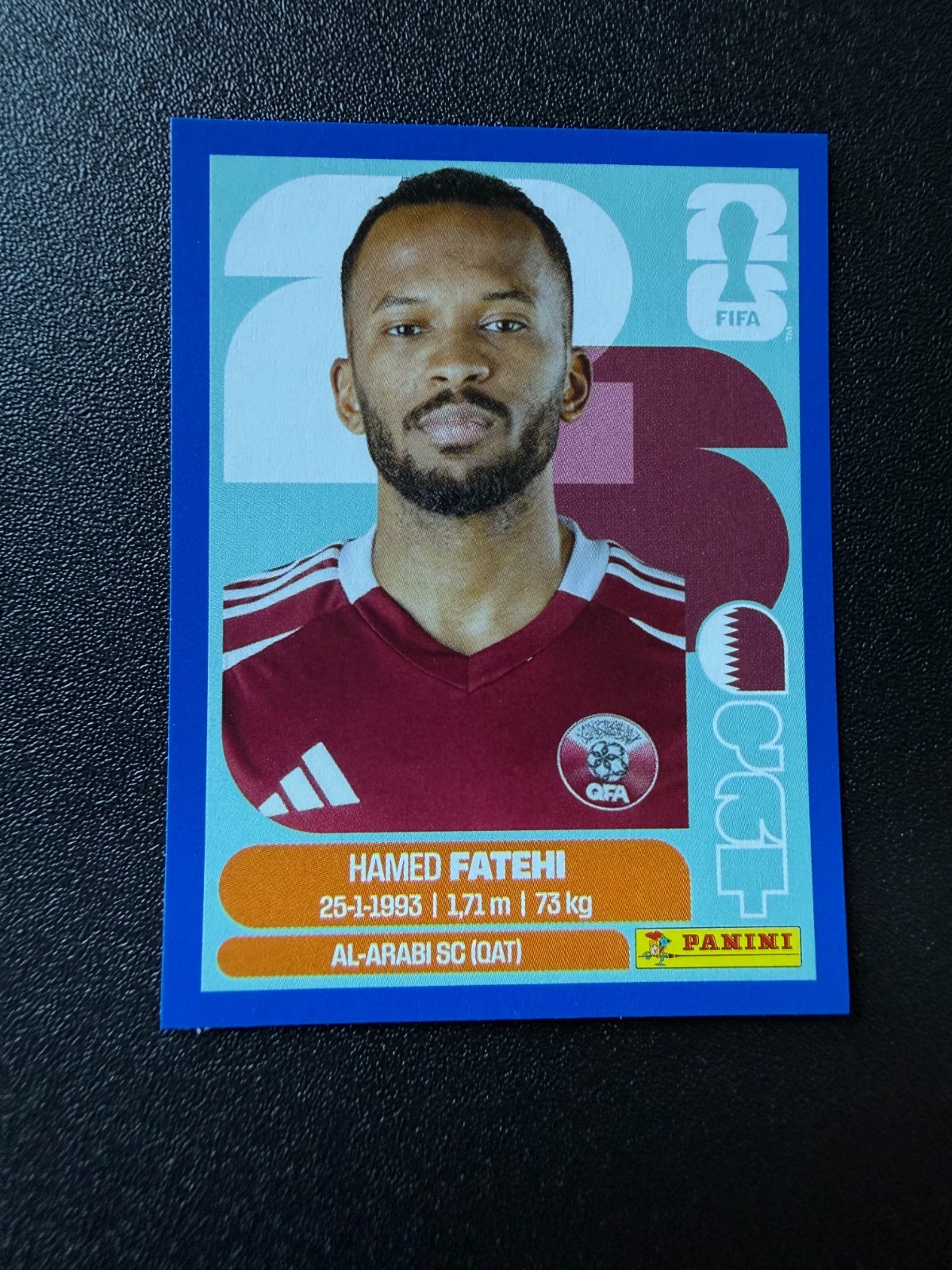 2026 Panini FIFA World Cup Sticker Hamed Fatehi #QAT 12 – Qatar Blue Parallel