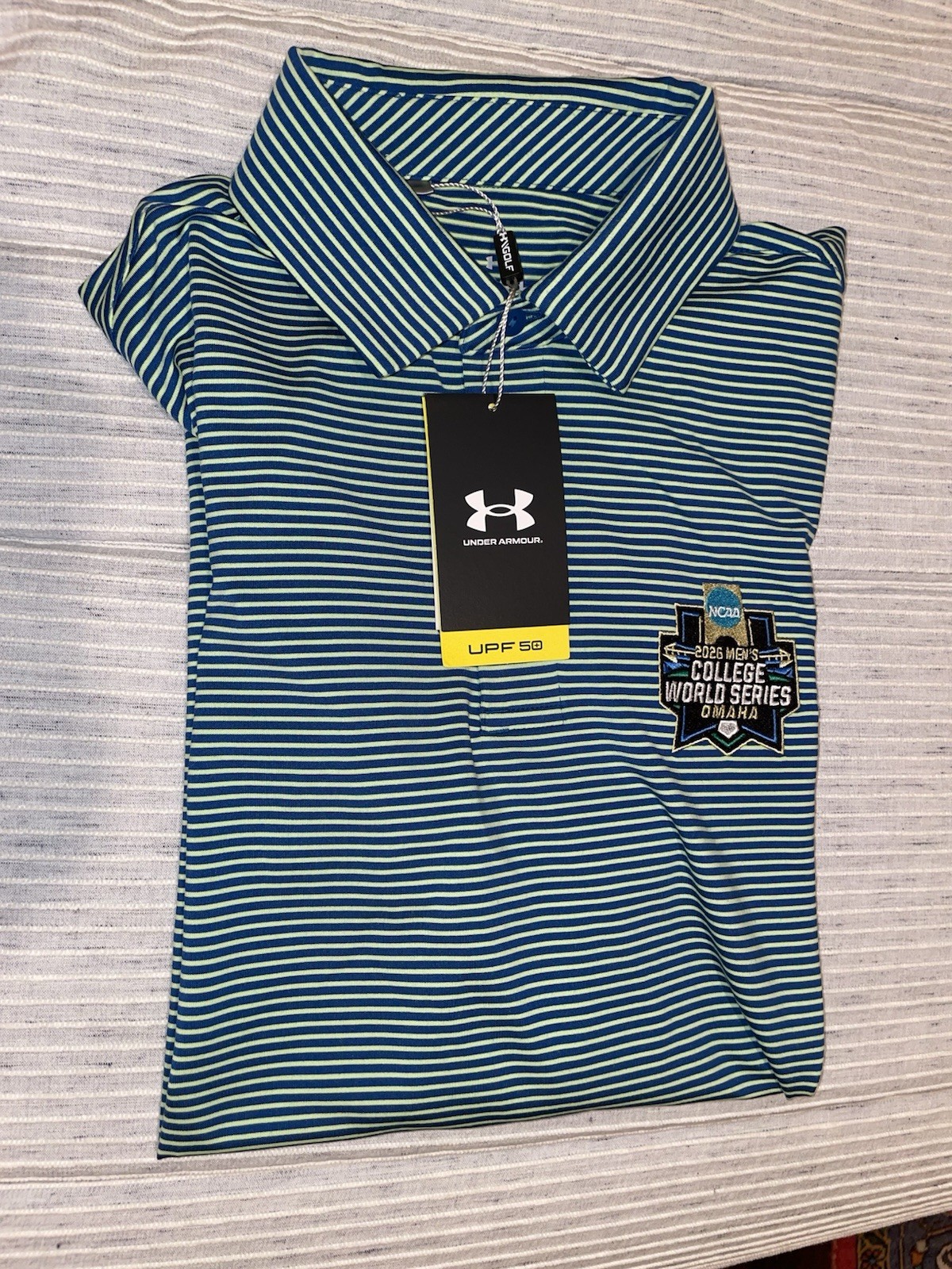 Under Armour 2026 Men’s College World Series Blue/Green Striped Polo Shirt Small