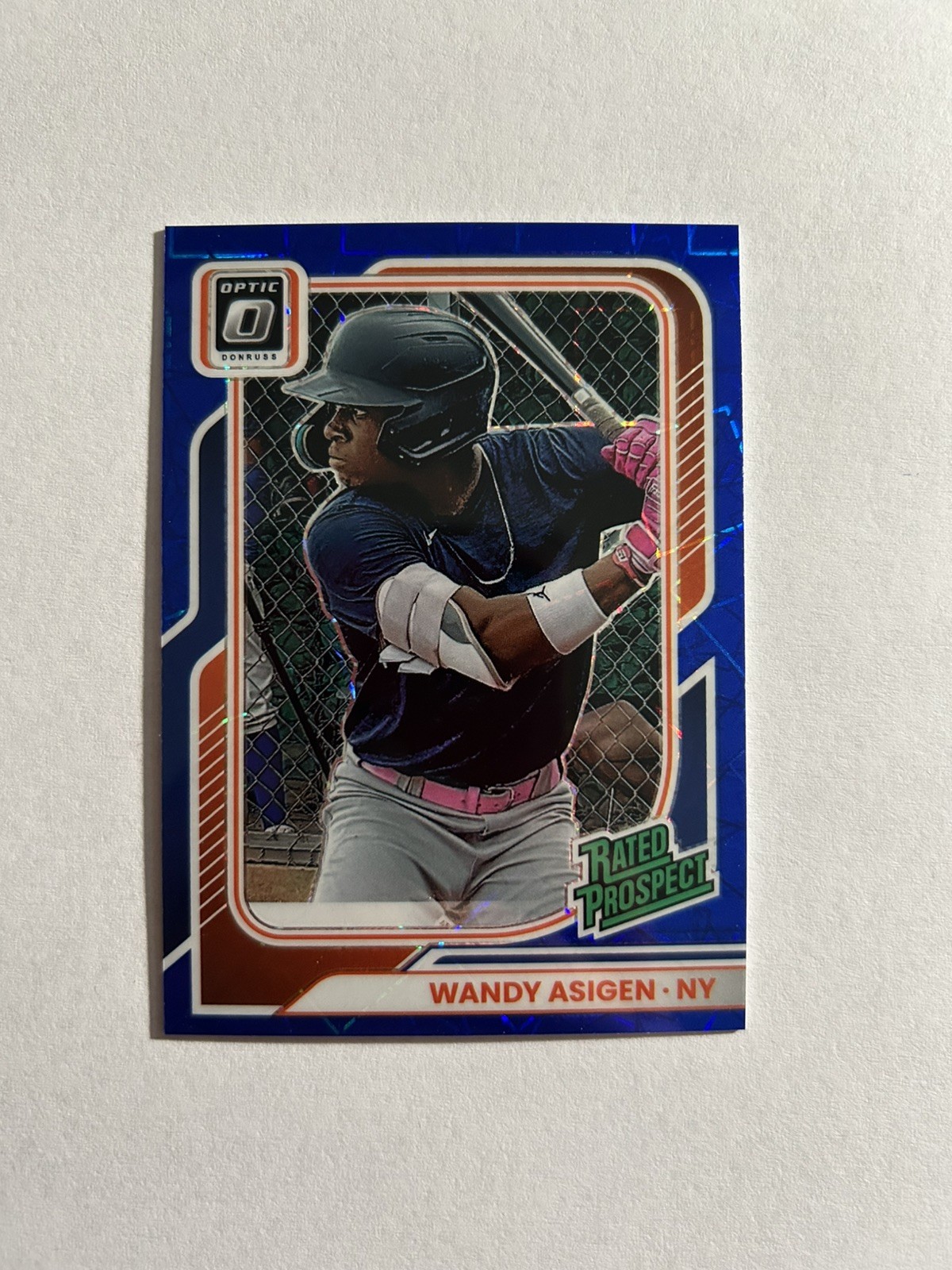 2026 Panini Donruss – Wandy Asigen #170 Blue Velocity Optic Prizm