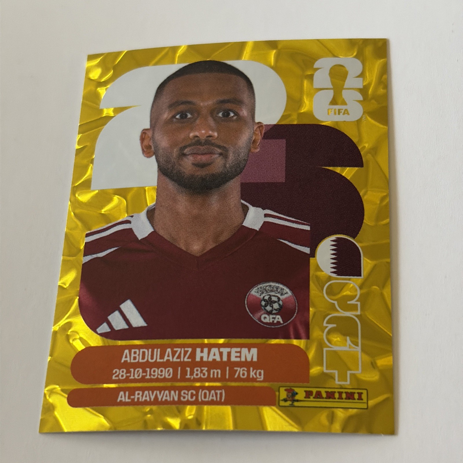 2026 Panini FIFA World Cup Stickers – Abdulaziz Hatem Gold Crumple #QAT 15 Qatar