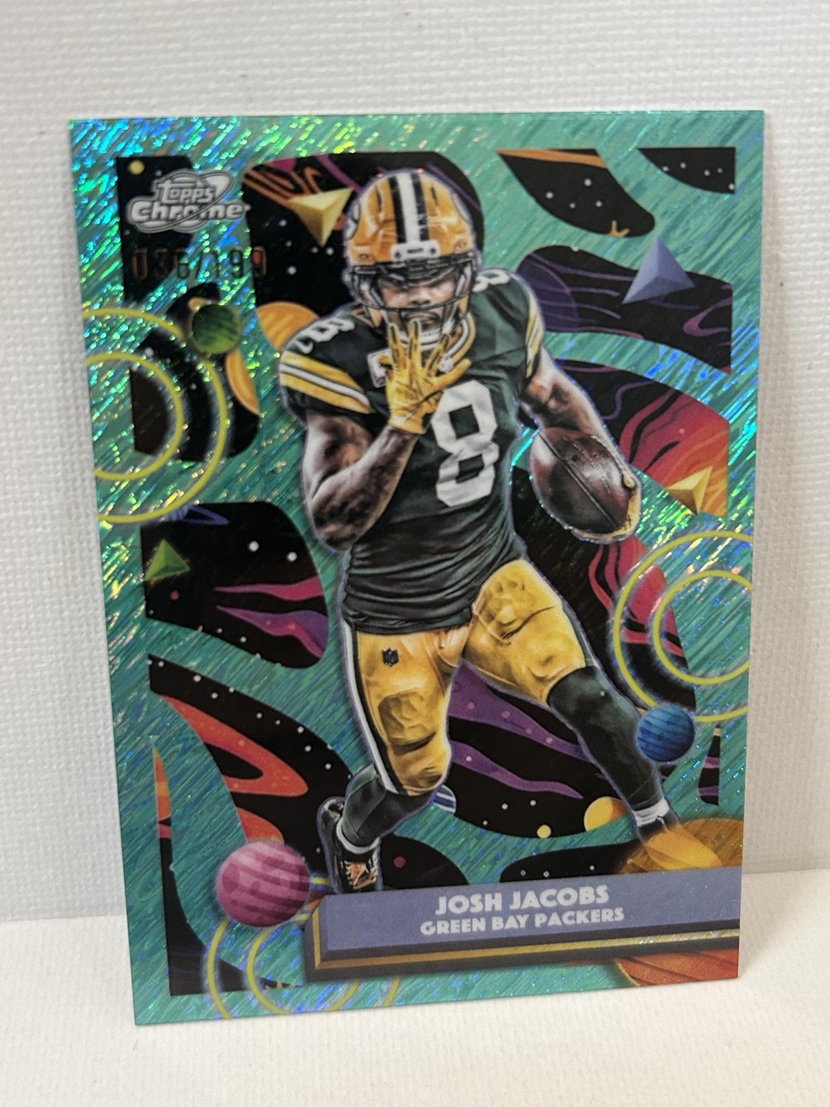 2025 Topps Cosmic Chrome – Josh Jacobs #36 Aqua Equinox Refractor /199