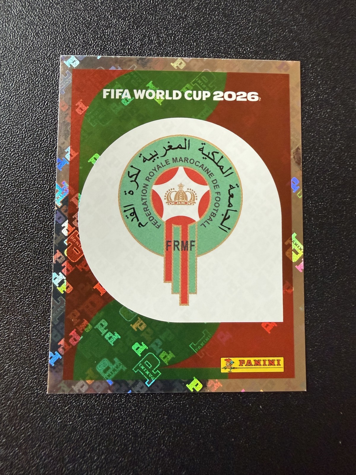 2026 Panini FIFA World Cup Stickers (United Edition) #MAR 1 Emblem FOIL