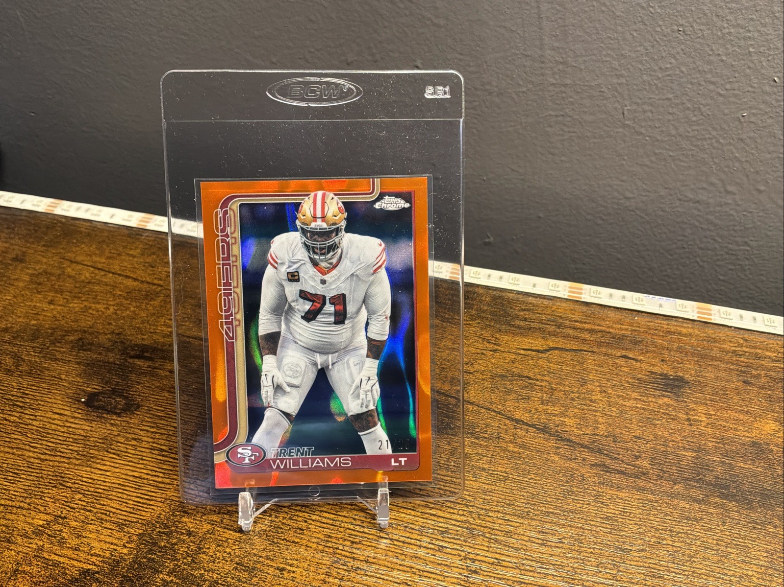 Trent Williams 2025 Topps Chrome Orange Wave Refractor /25 49ers #265