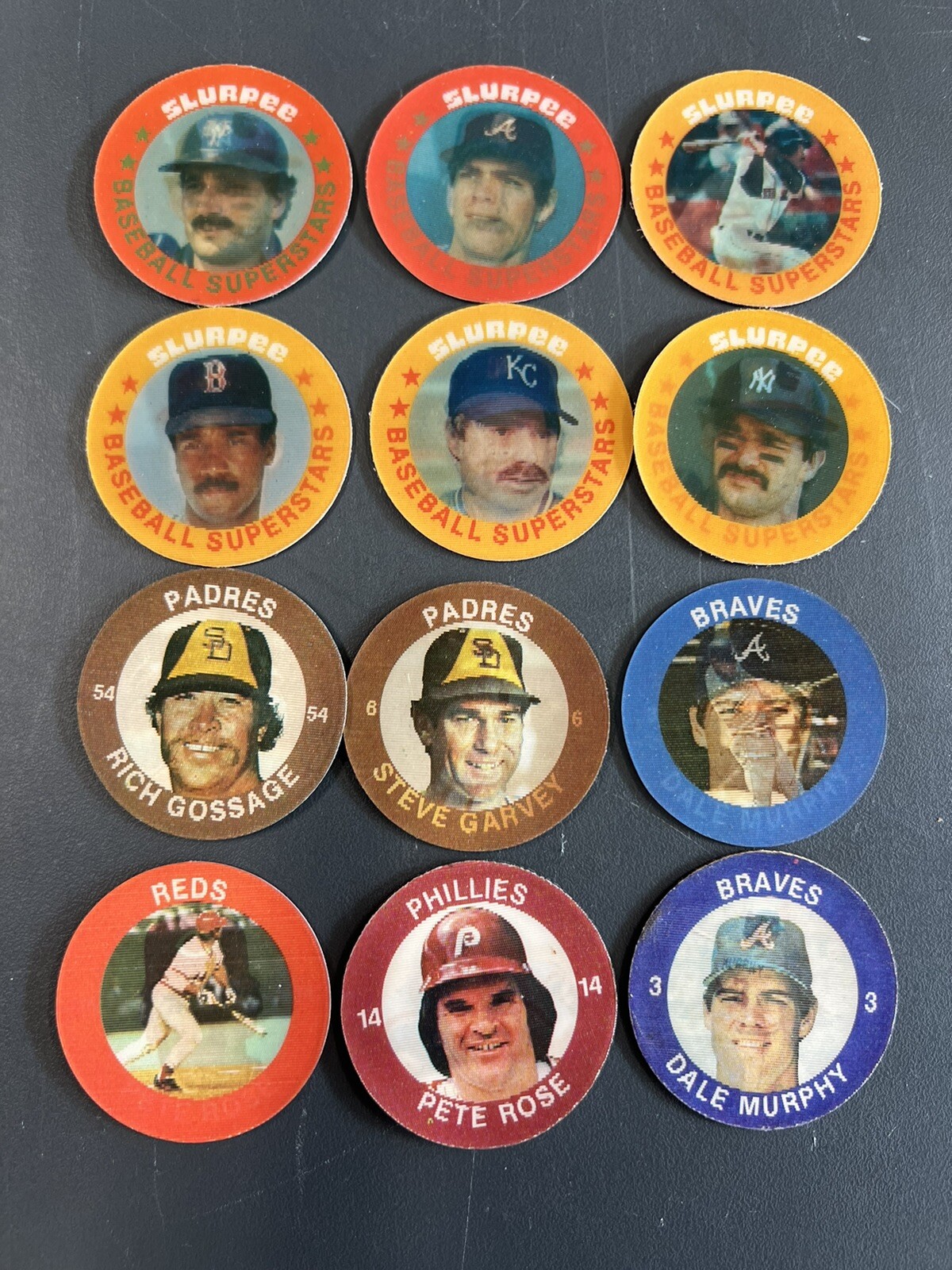 Lot of 12: 1984-85-86 7-11 Slurpee MLB Coins Rose Mattingly Ripken Schmidt Brett