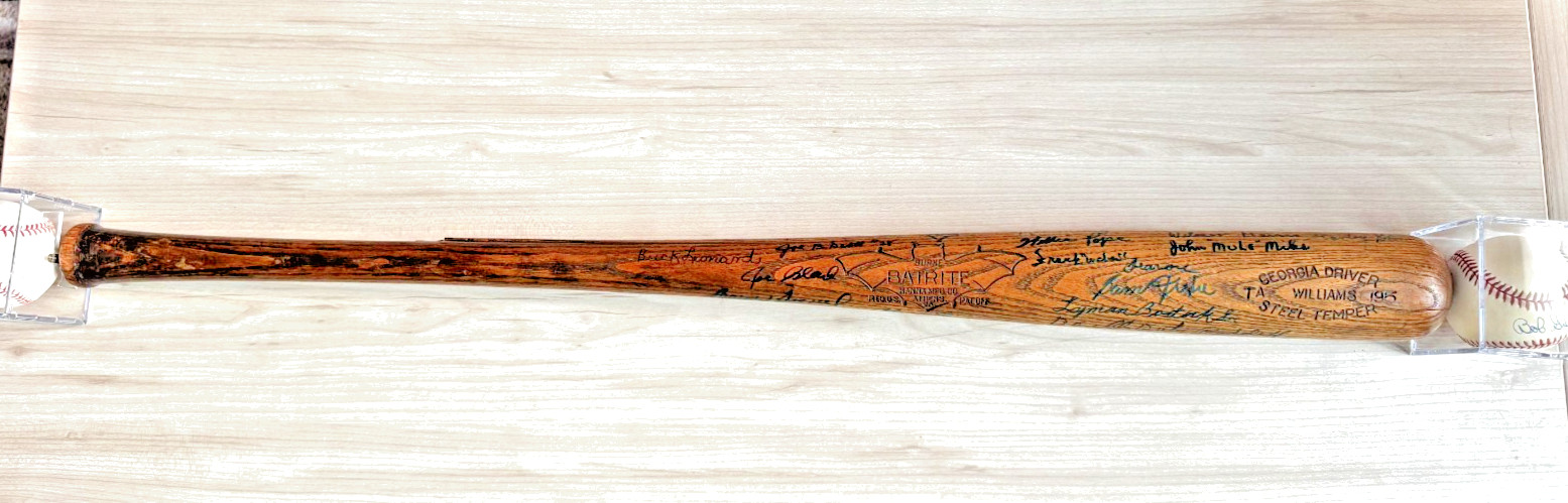 Negro League Hall of Famers and Stars autographed vintage baseball bat. 40 sigs